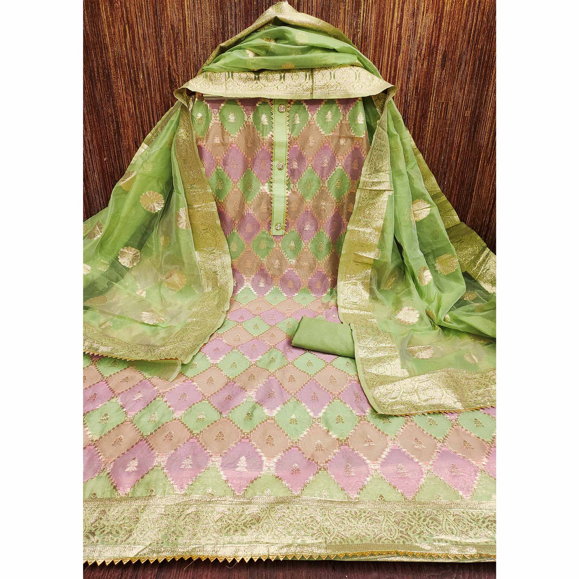 Rich Green Organza Dress Material With Intricate Zari Weaving Work