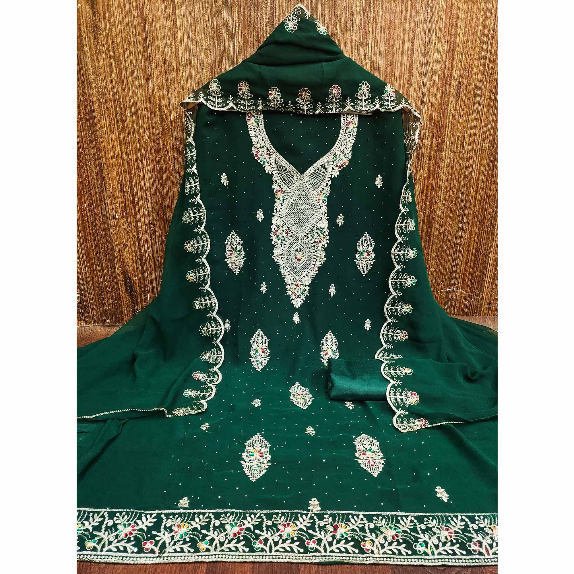 Green Georgette Dress Material Adorned With Elegant Floral Embroidery & Shimmering Swarovski Work
