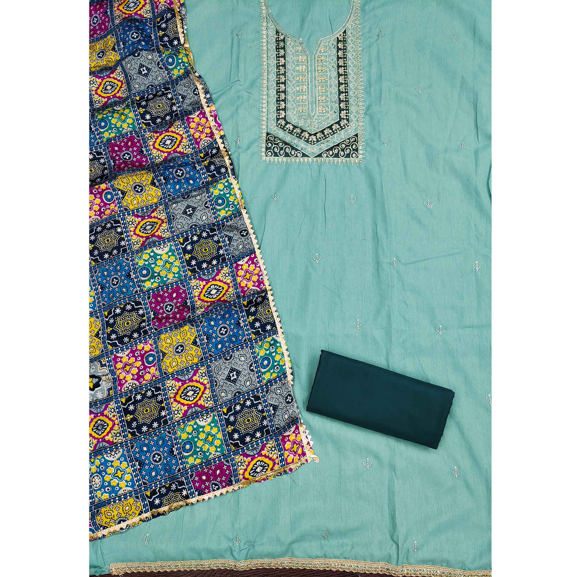 Stylish Turquoise Cotton Blend Dress Material Enriched With Floral Embroidery & Sequins Work