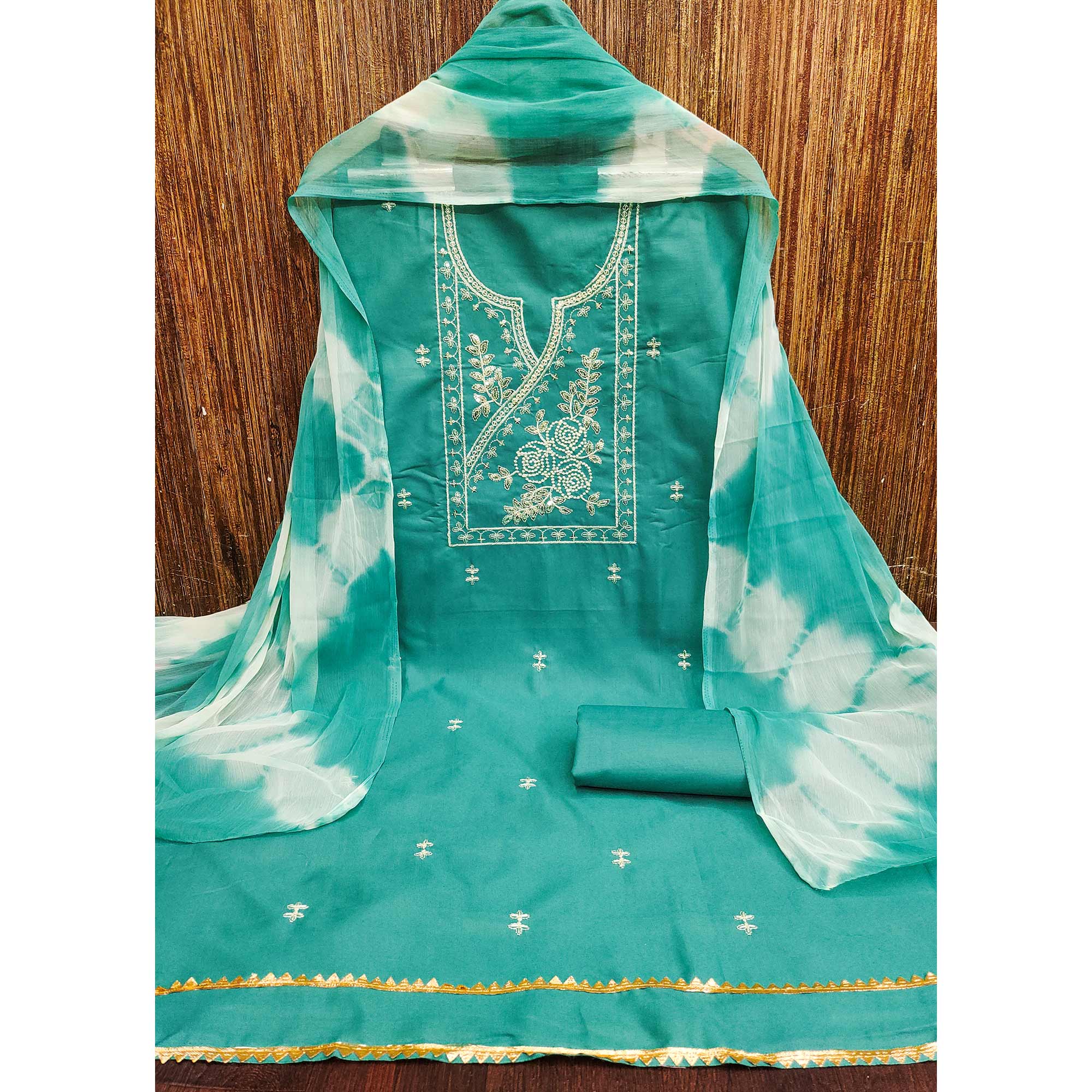 Turquoise Cotton Blend Dress Material Highlighted With Floral Thread & Sequins Work