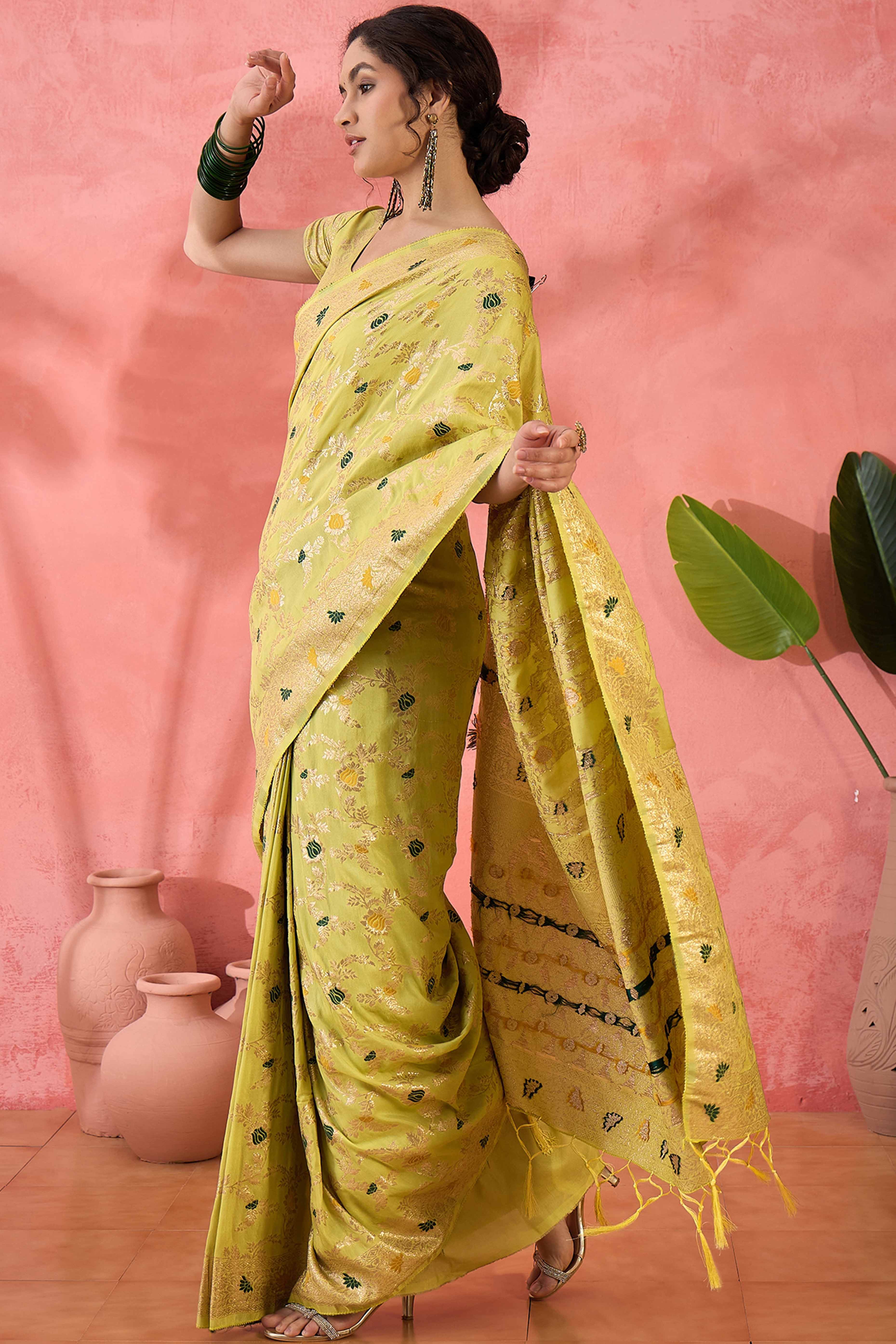 Light Yellow Cotton Blend Jacquard Saree Featuring Intricate Floral Weaving & Tassels On The Pallu