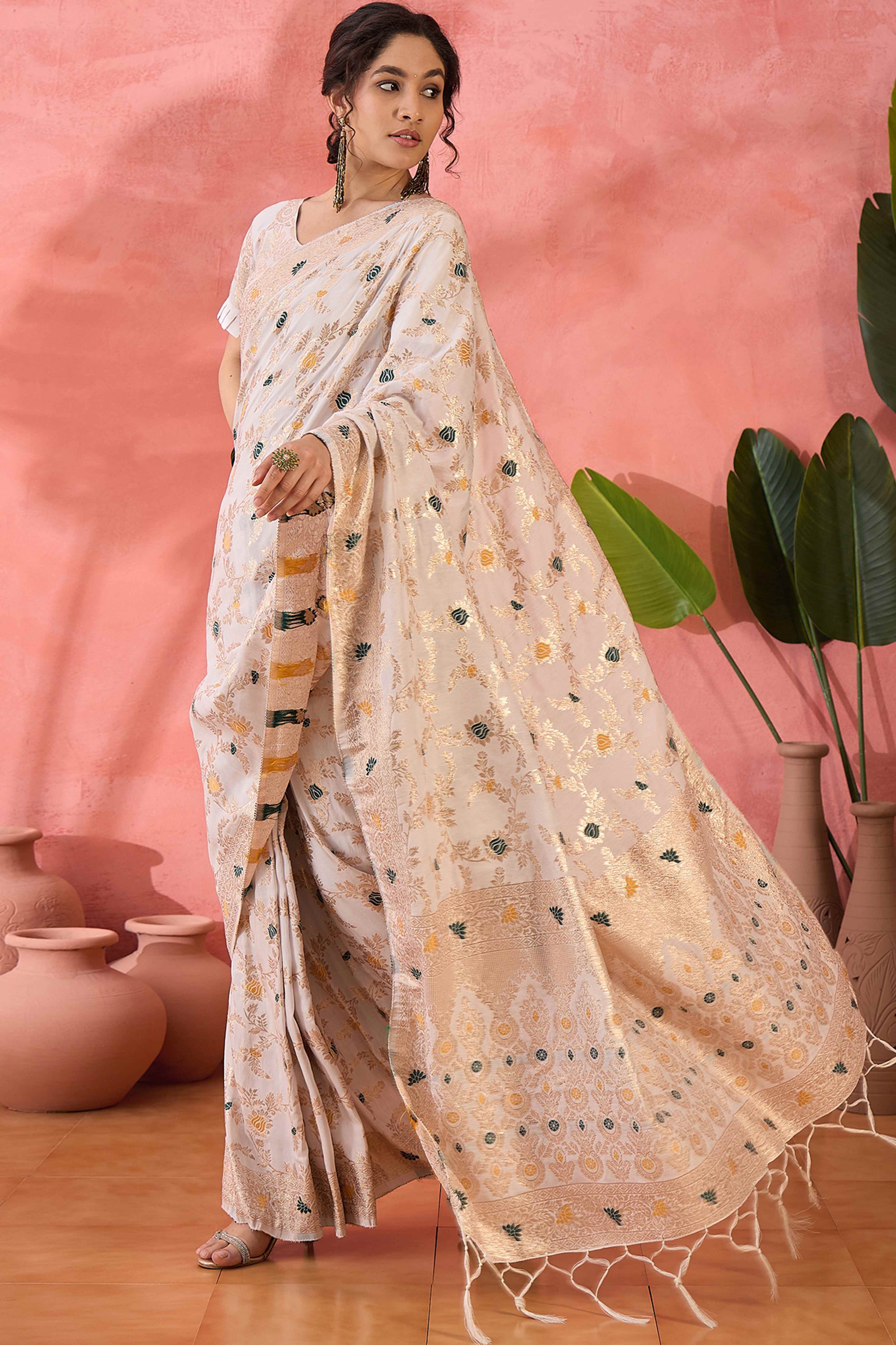 Offwhite Cotton Meena Jacquard Saree Featuring Intricate Floral Weaving & Tassels On The Pallu