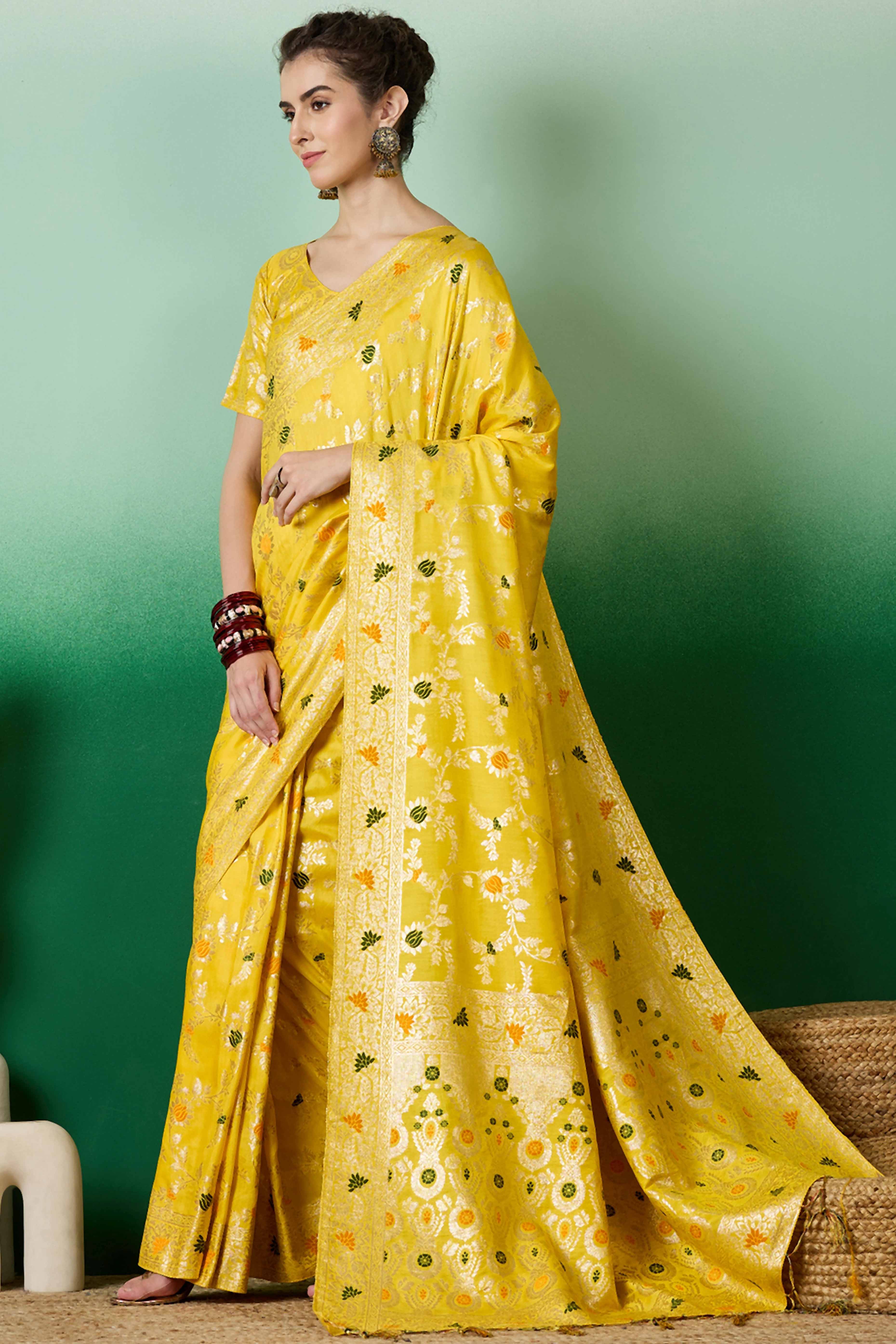 Yellow Cotton Meena jacquard Saree Featuring Intricate Floral Weaving & Tassels On The Pallu