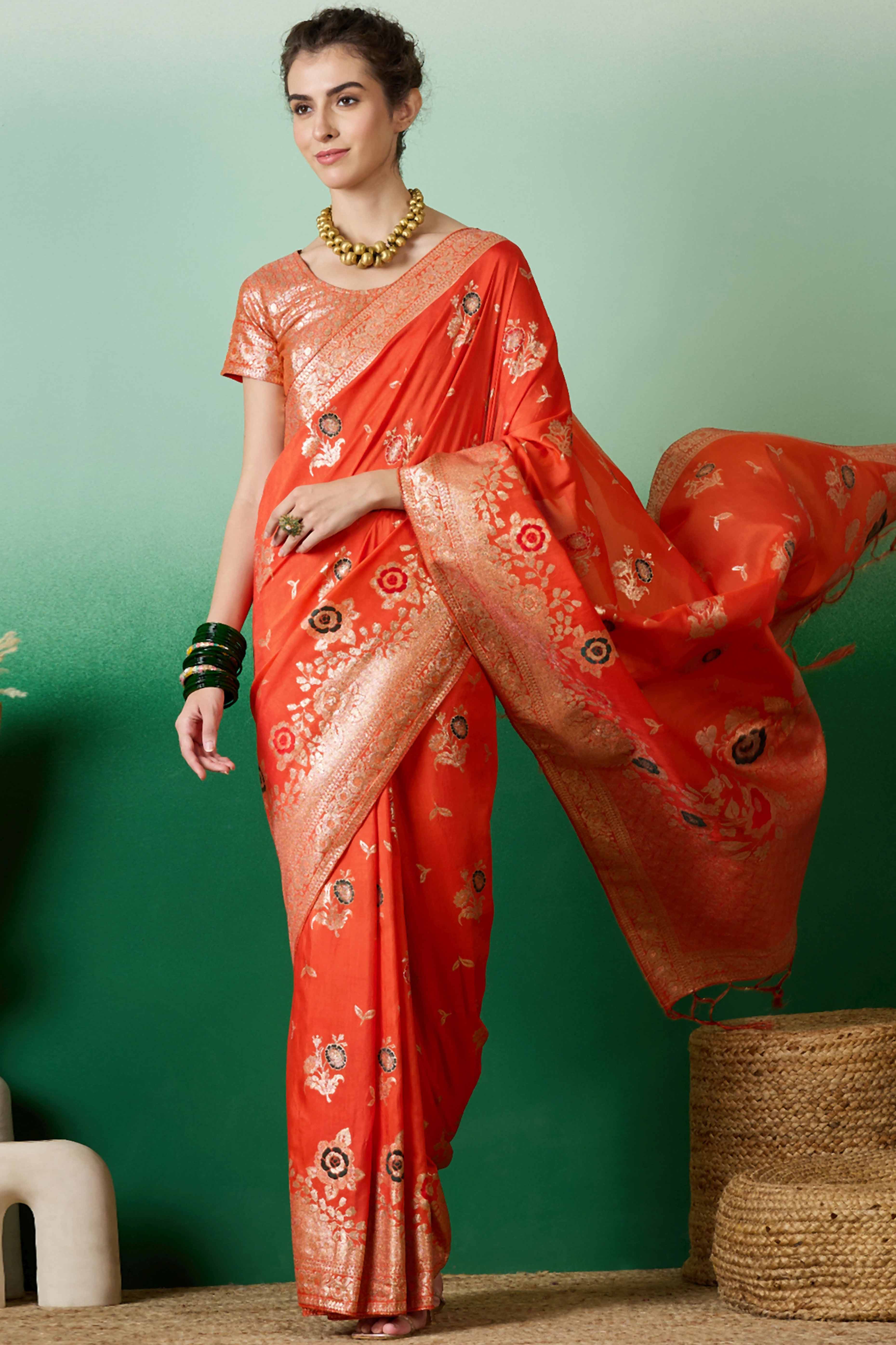 Orange Cotton Blend Saree Embellished With Floral Zari Weaving & Tasselled Pallu