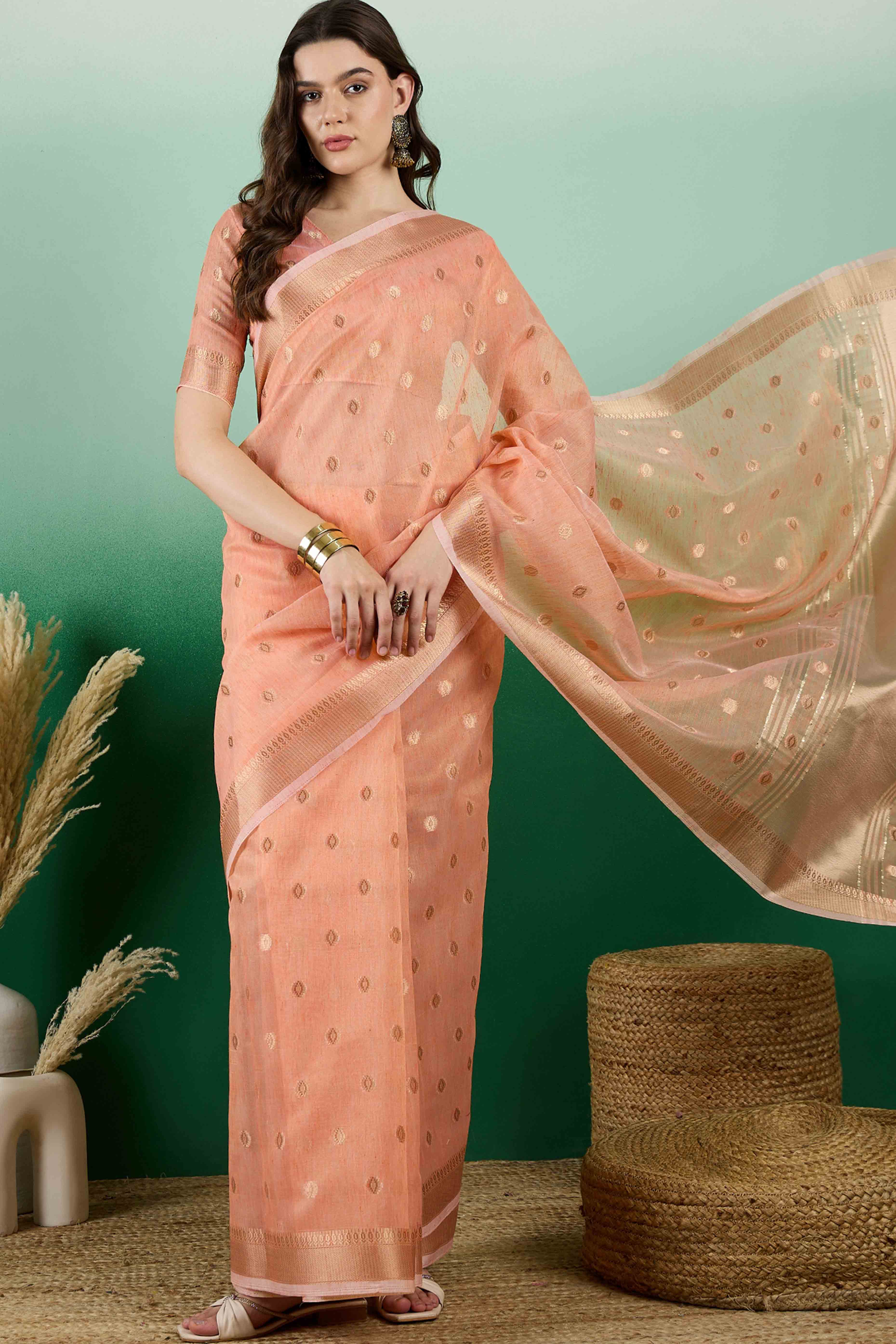 Orange Khadi Organza Saree Embellished With Traditional Zari Work & Tassels