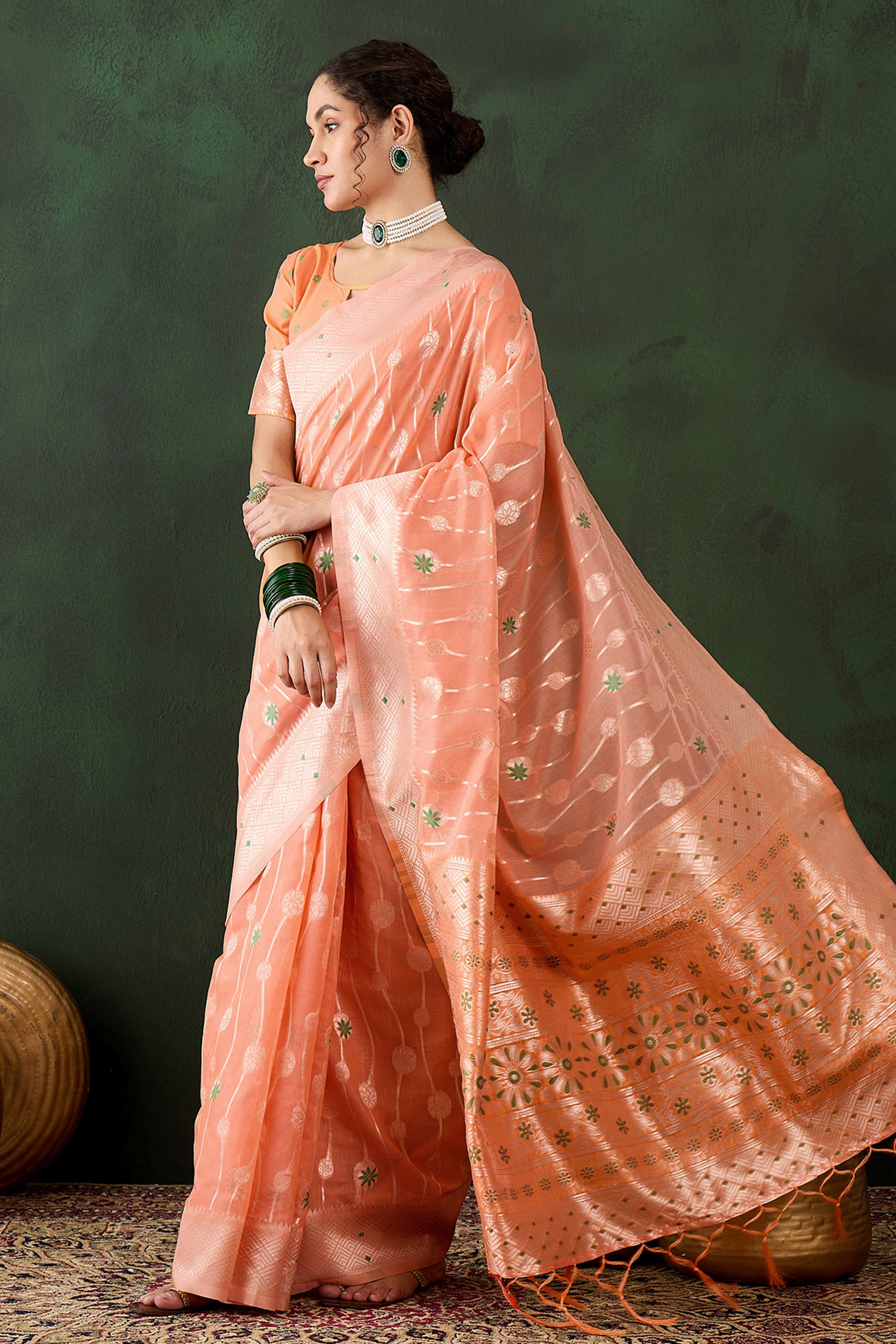 Orange Cotton Blend Saree Adorned With Intricate Floral Zari Weaving & A Stylish Tassel Pallu