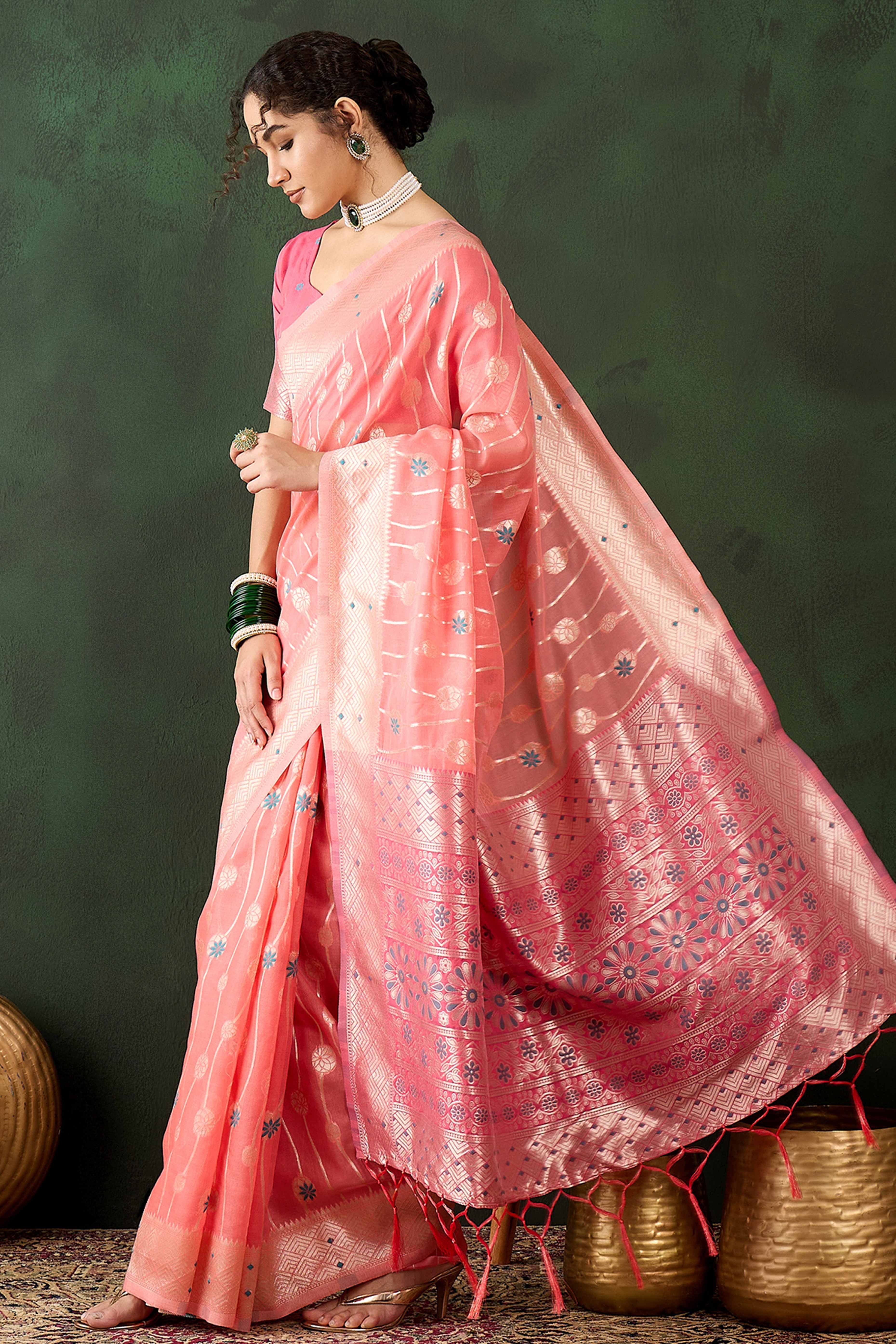 Peach Cotton Blend Saree Adorned With Intricate Floral Zari Weaving & A Stylish Tassel Pallu