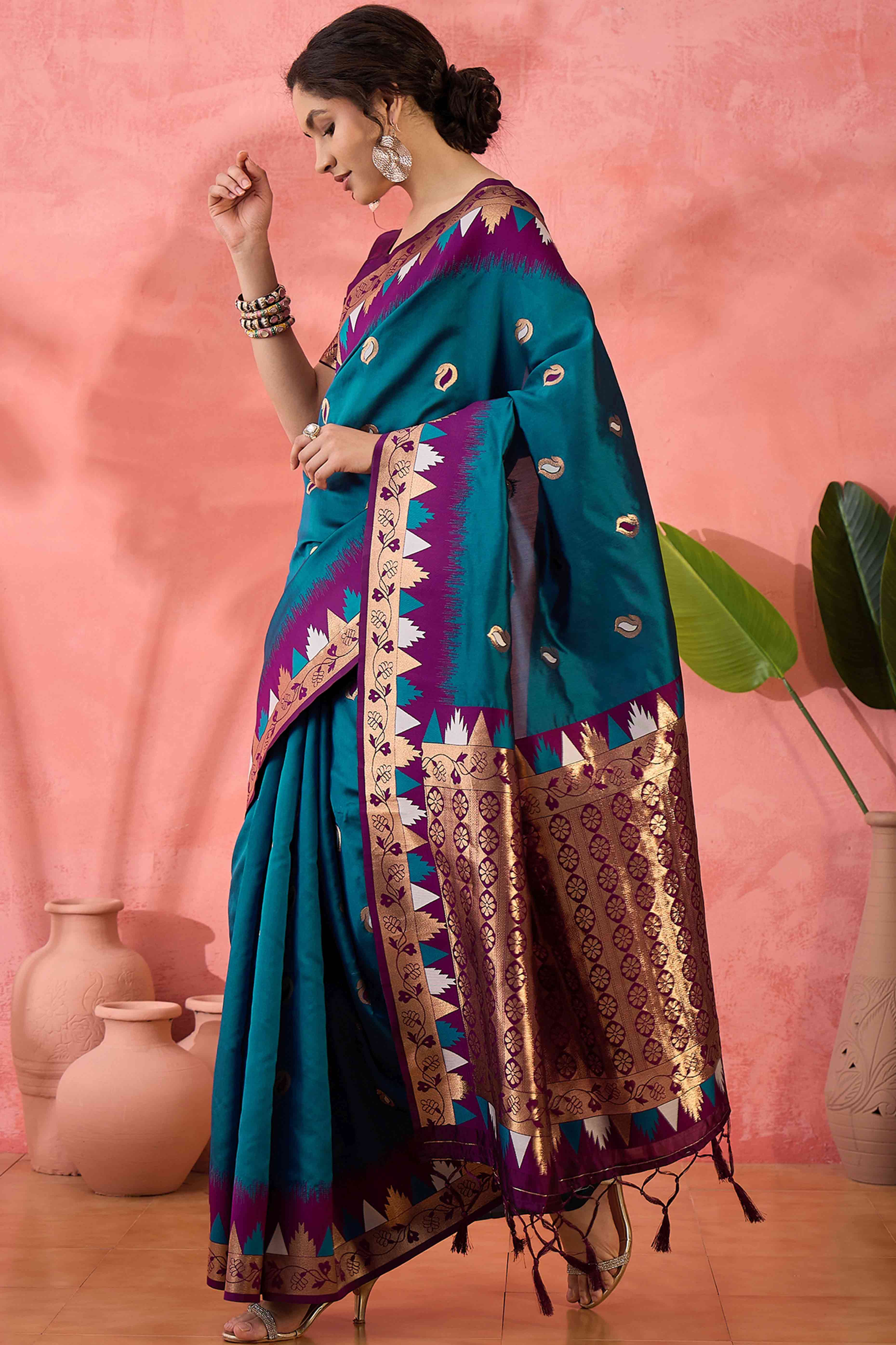 Morpich Blue Zari Woven Poly Silk Saree Enhanced With Graceful Tassel Detailing