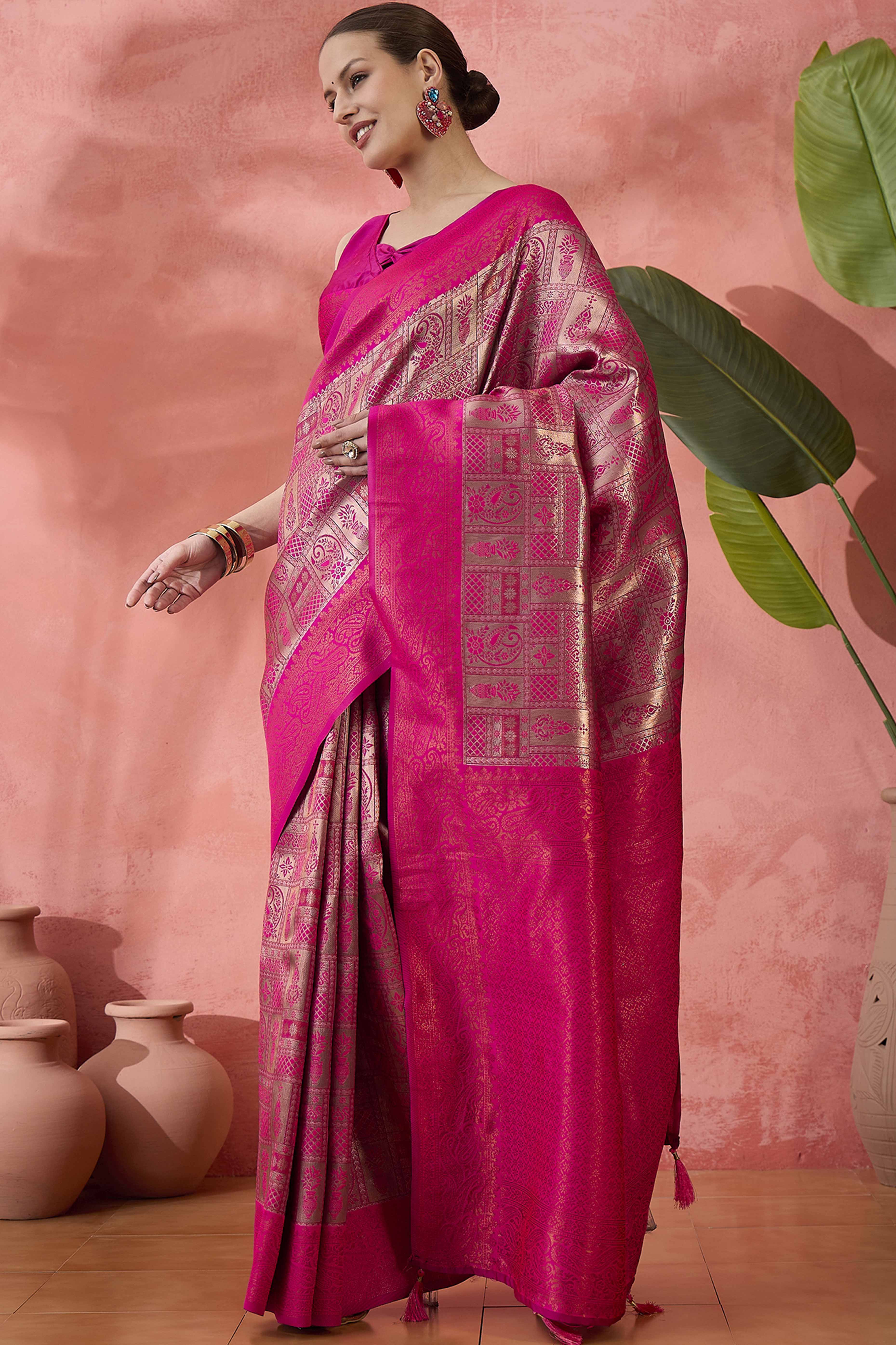 Rani Pink Woven Poly Silk Blend Saree Featuring Floral & Paisley Motifs With Tassel Accents