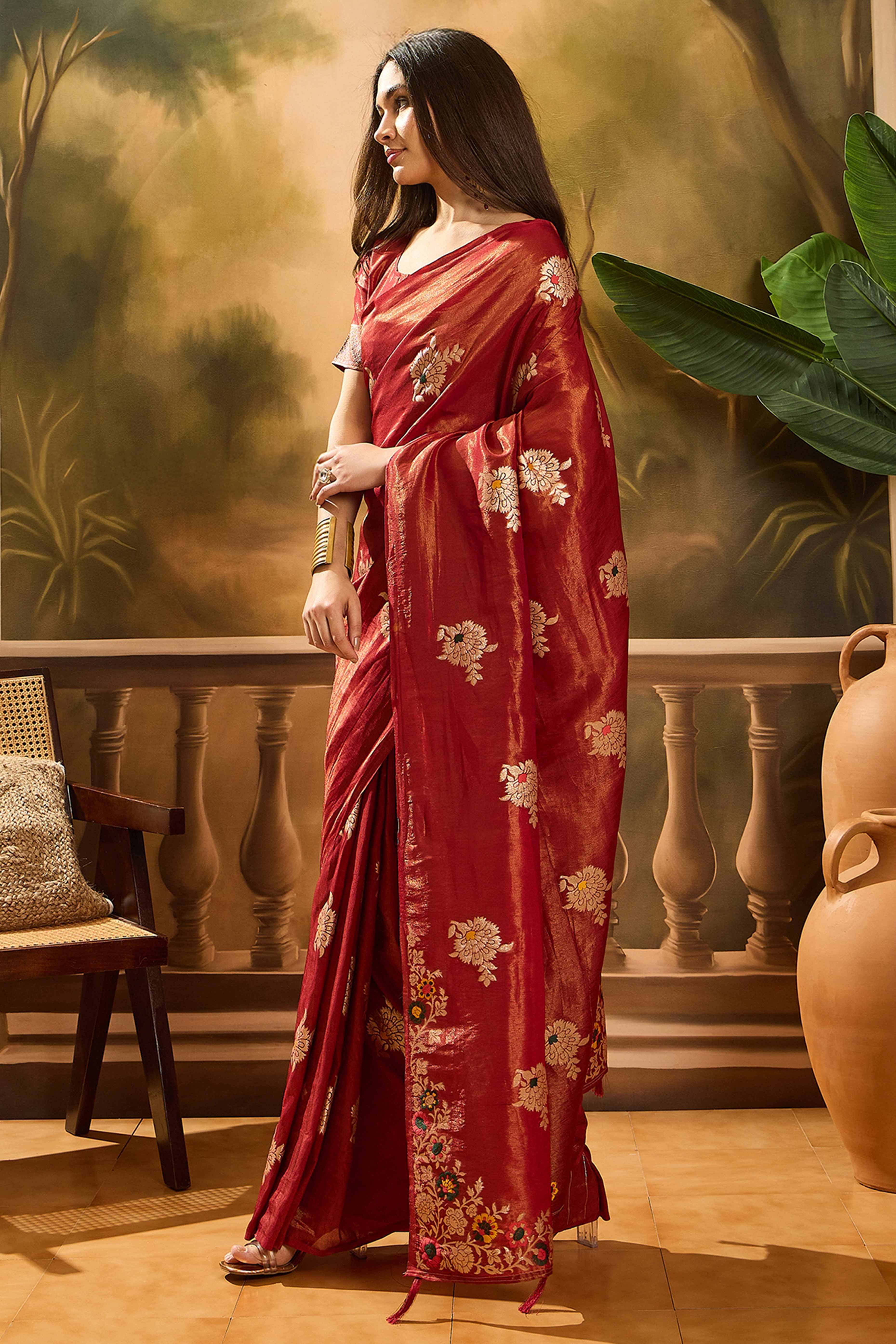 Maroon Shimmer Saree Featuring Intricate Floral Zari Weaving & Tassel Finish