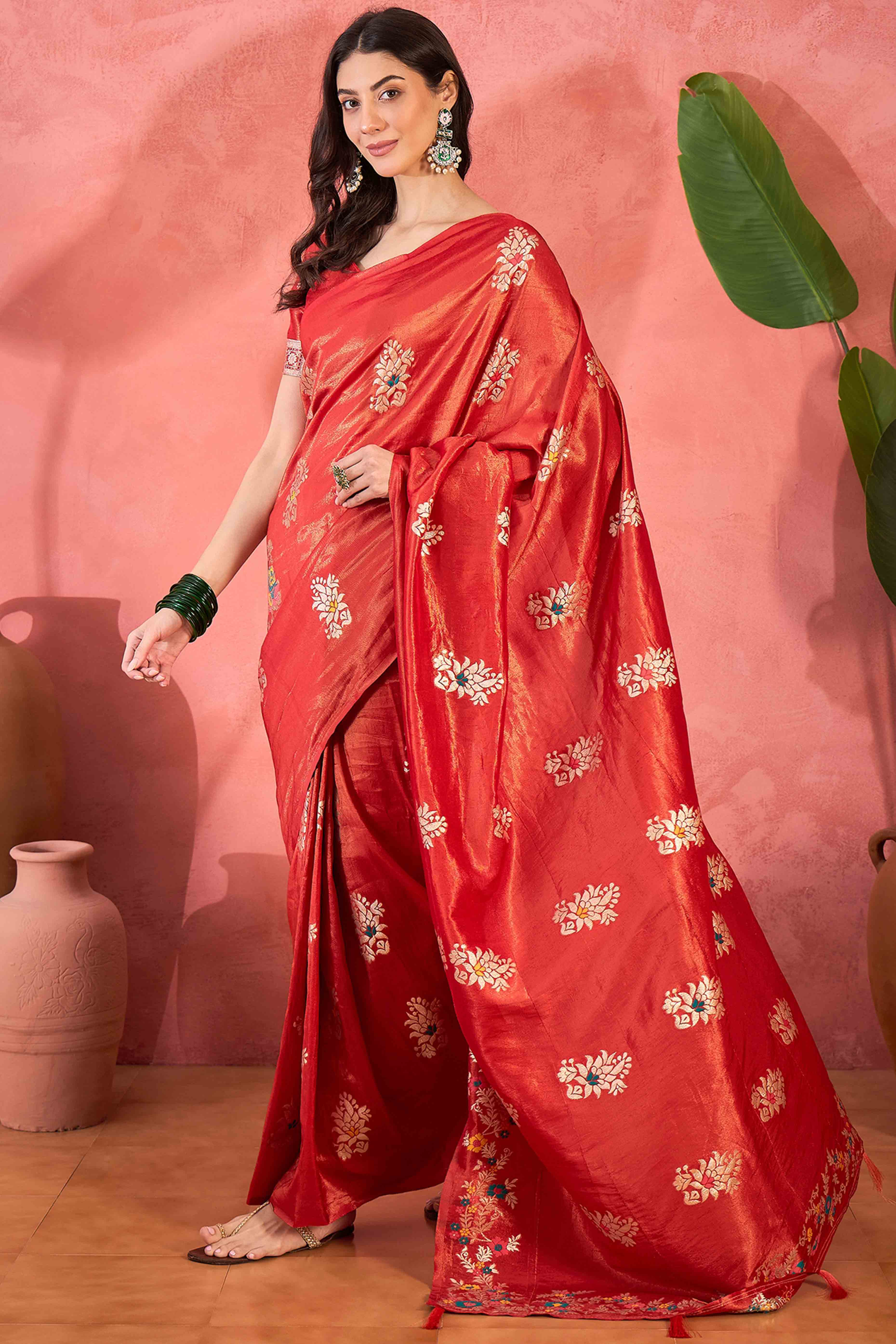 Red Shimmer Saree Showcasing Floral Zari Weaving & A Tasselled Pallu