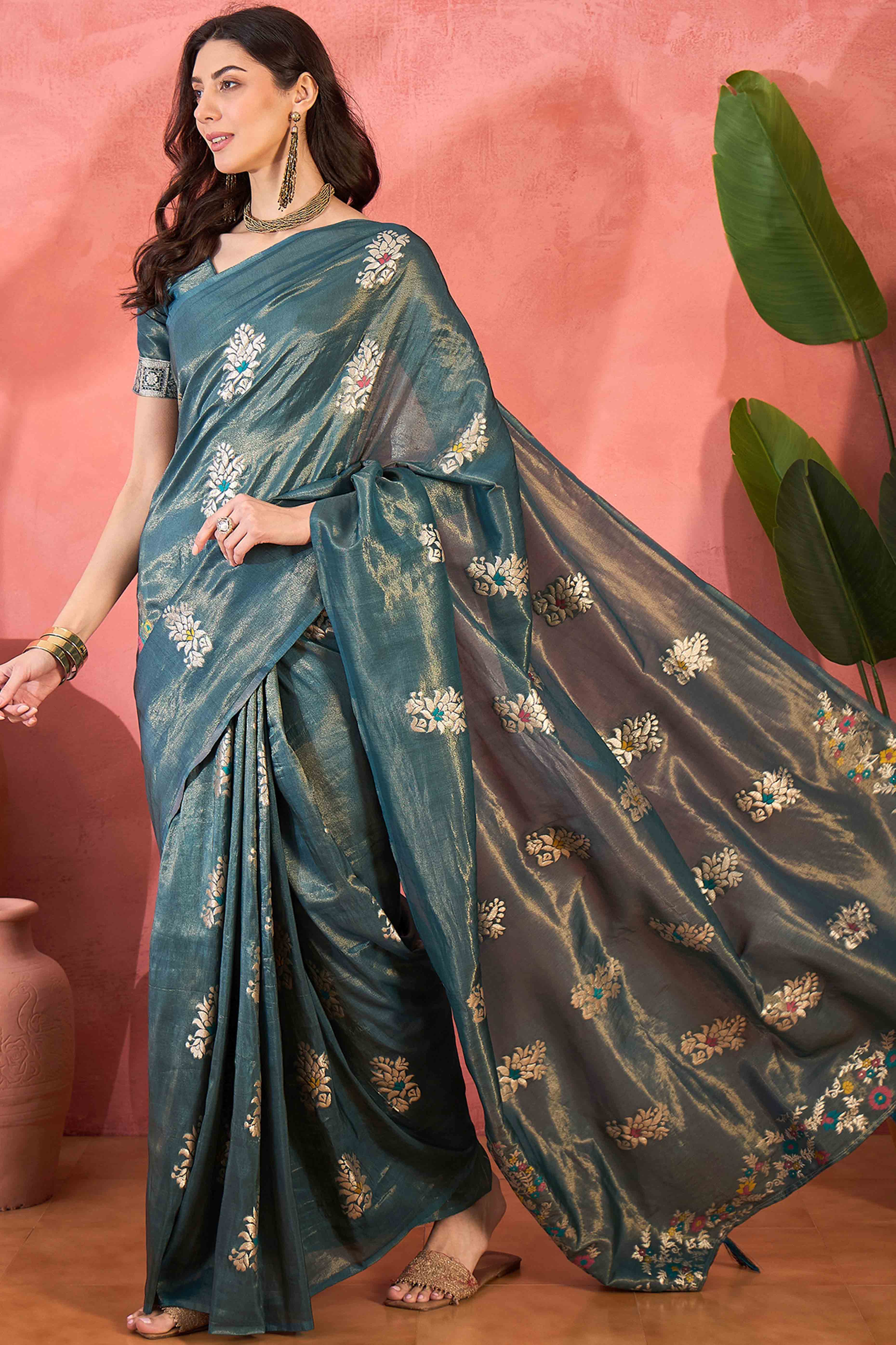 Teal Shimmer Saree Showcasing Floral Zari Weaving & A Tasselled Pallu