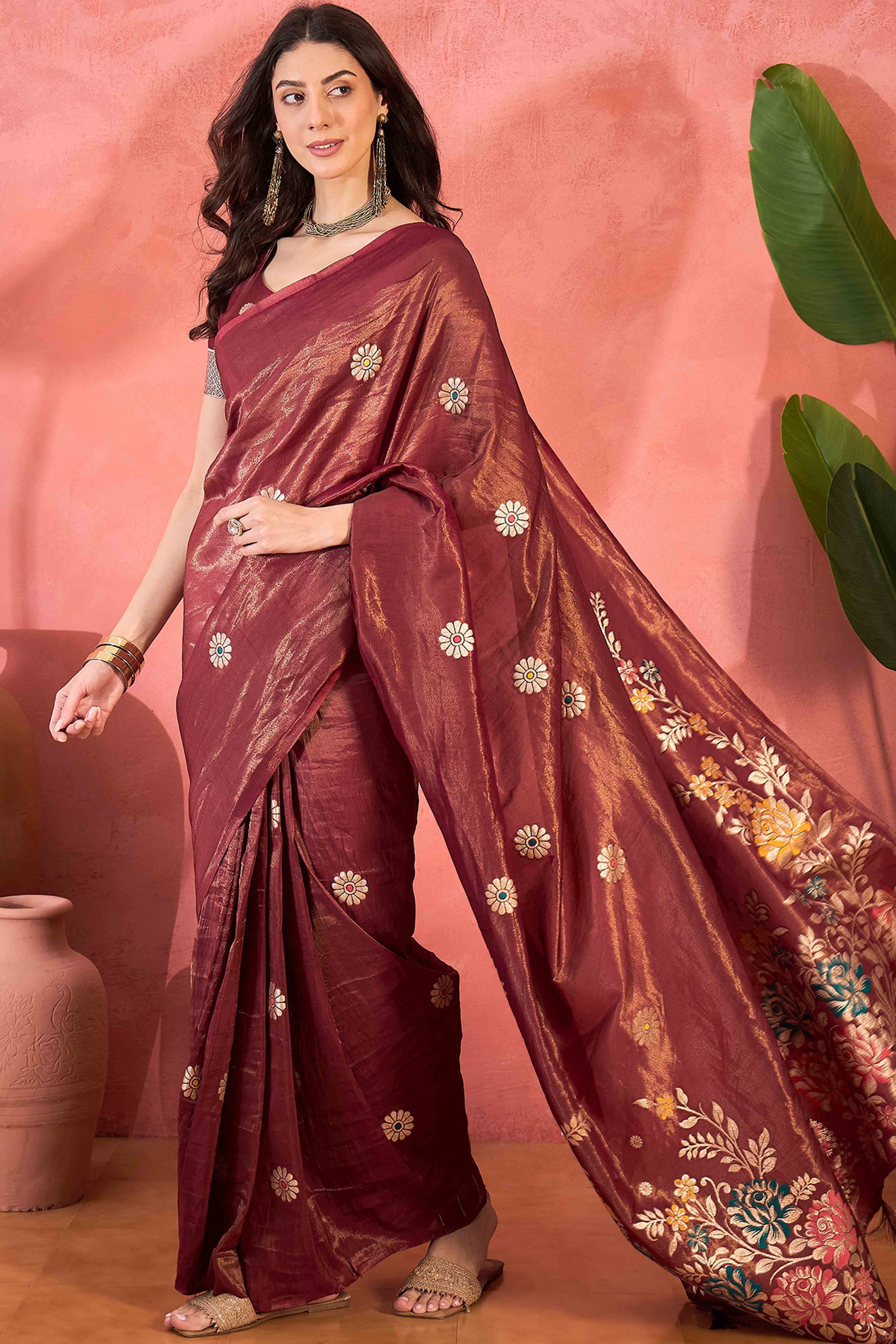 Maroon Shimmer Saree Adorned with Floral Zari Weaving & Tassel Pallu