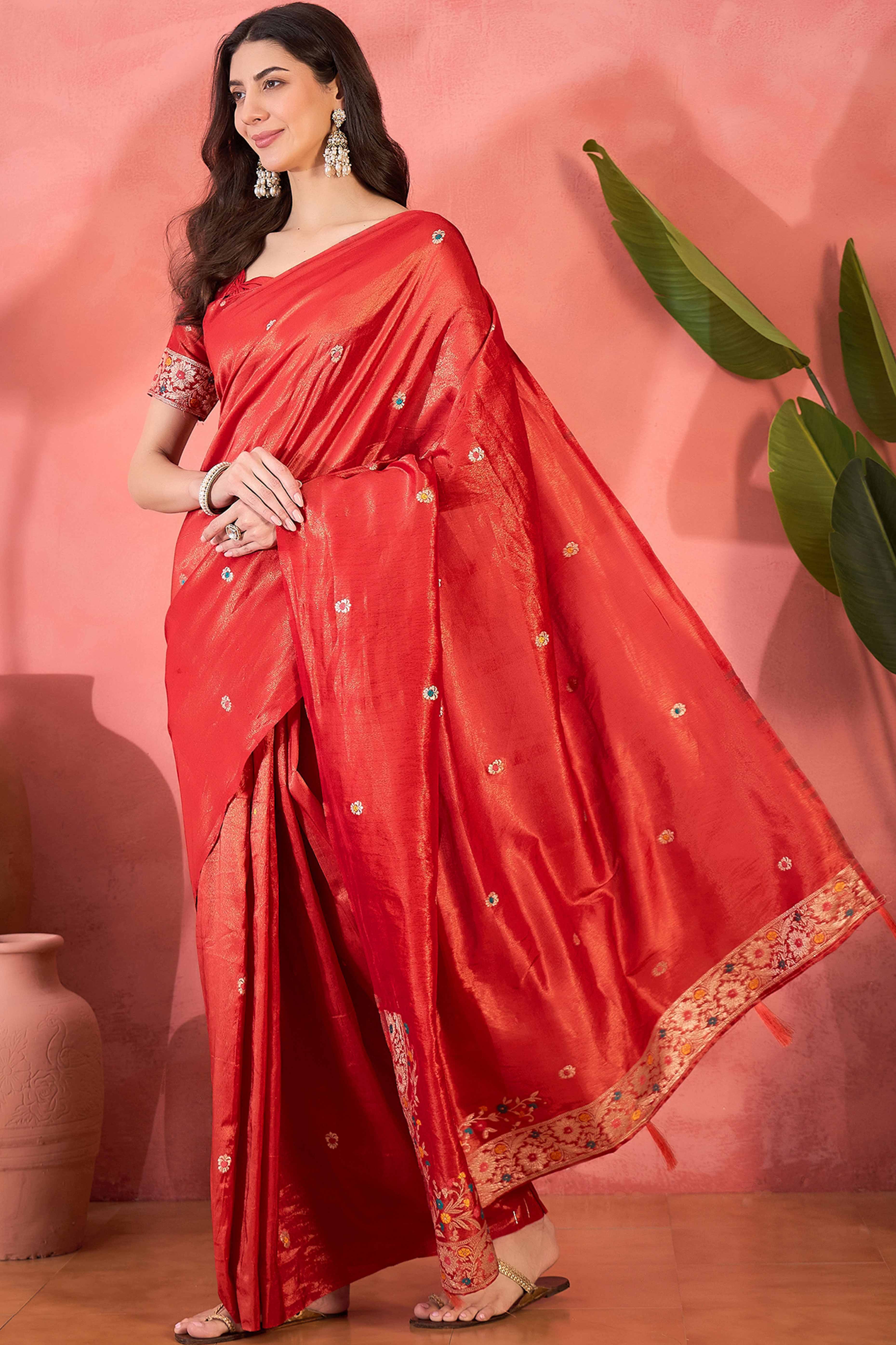 Red Zari Woven Shimmer Saree With Floral Motifs & Flowing Tassel Pallu
