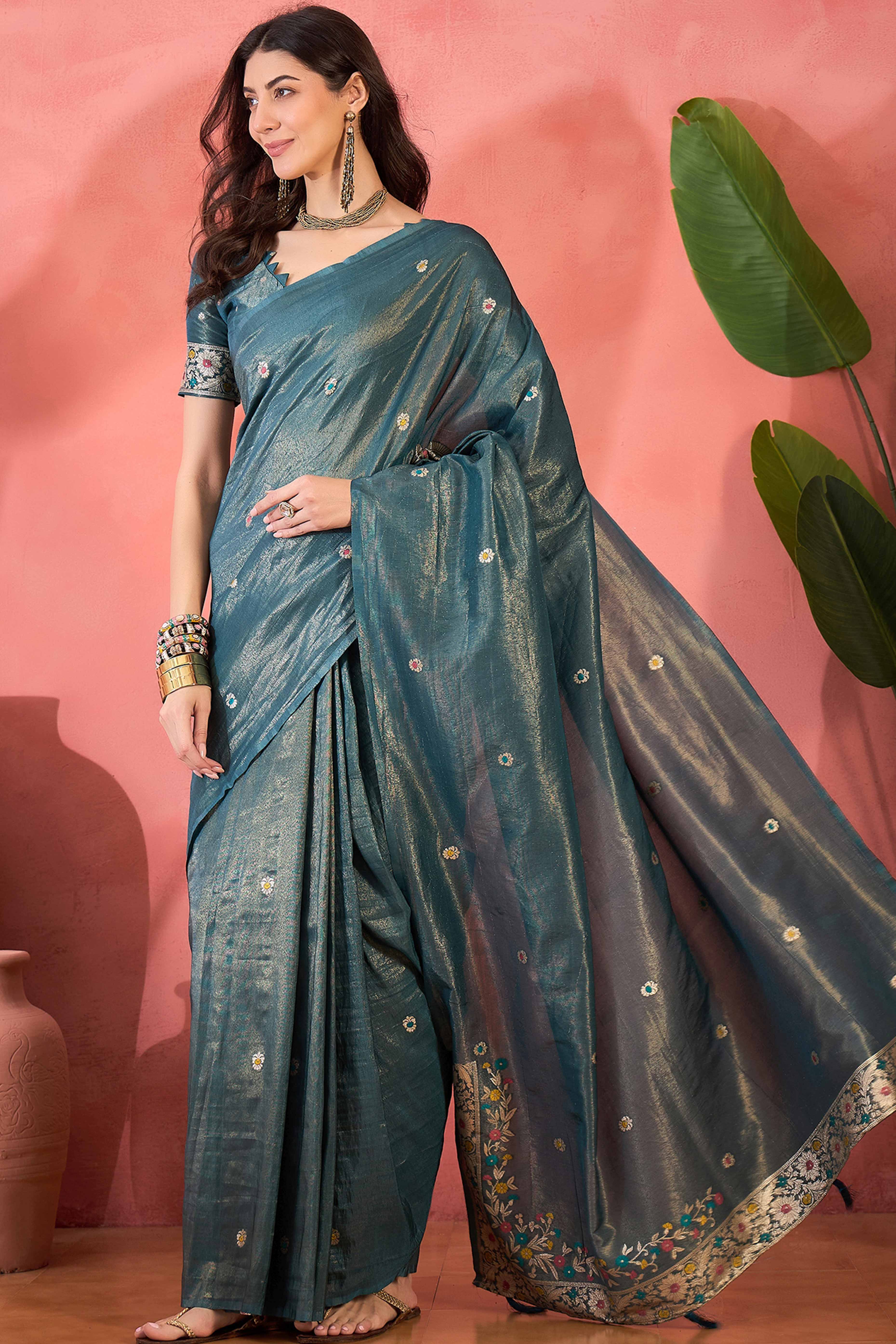 Teal Blue Zari Woven Shimmer Saree With Floral Motifs & Flowing Tassel Pallu