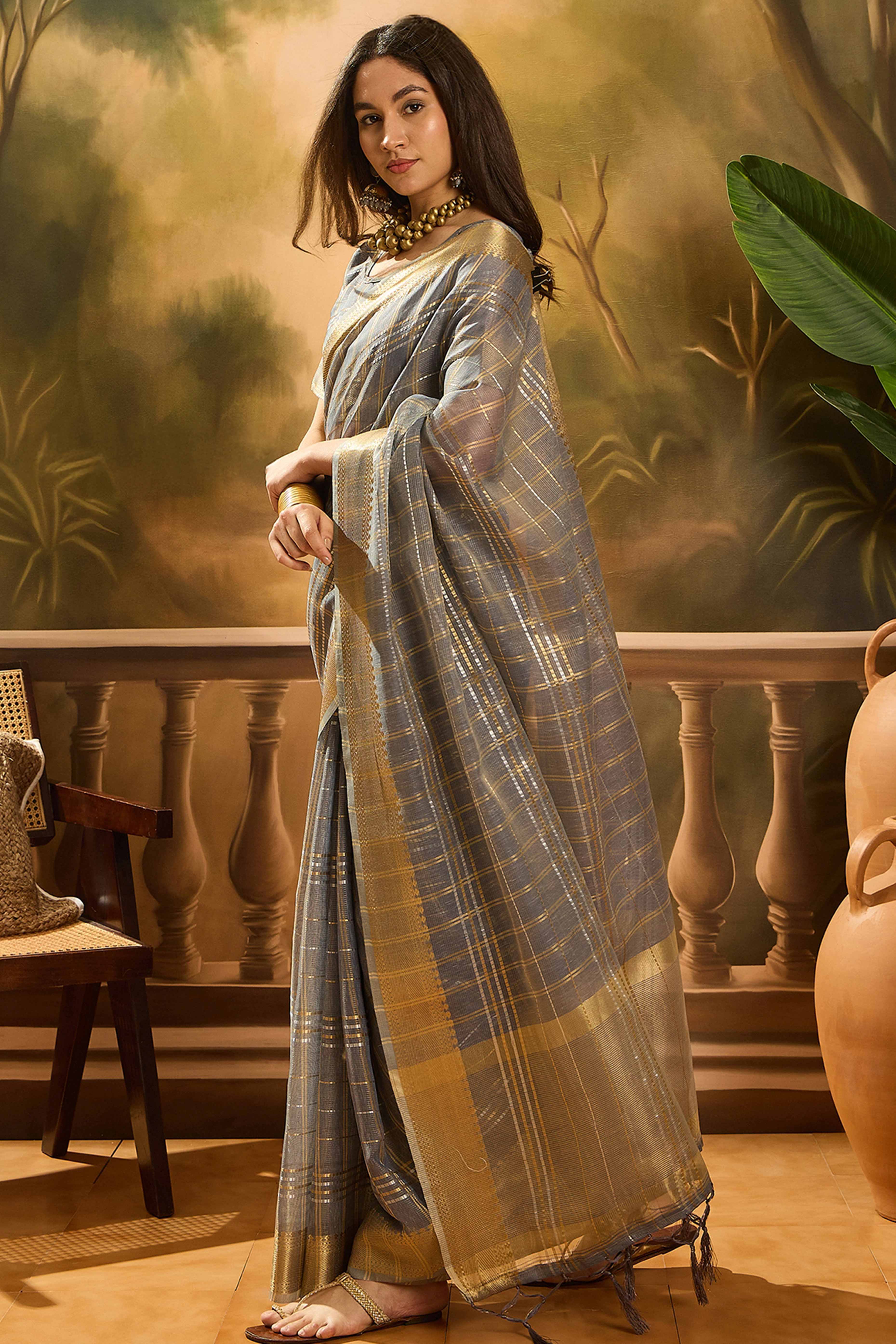 Grey Zari Woven Khadi Organza Saree Featuring Classic Checks & Tassel Detailing