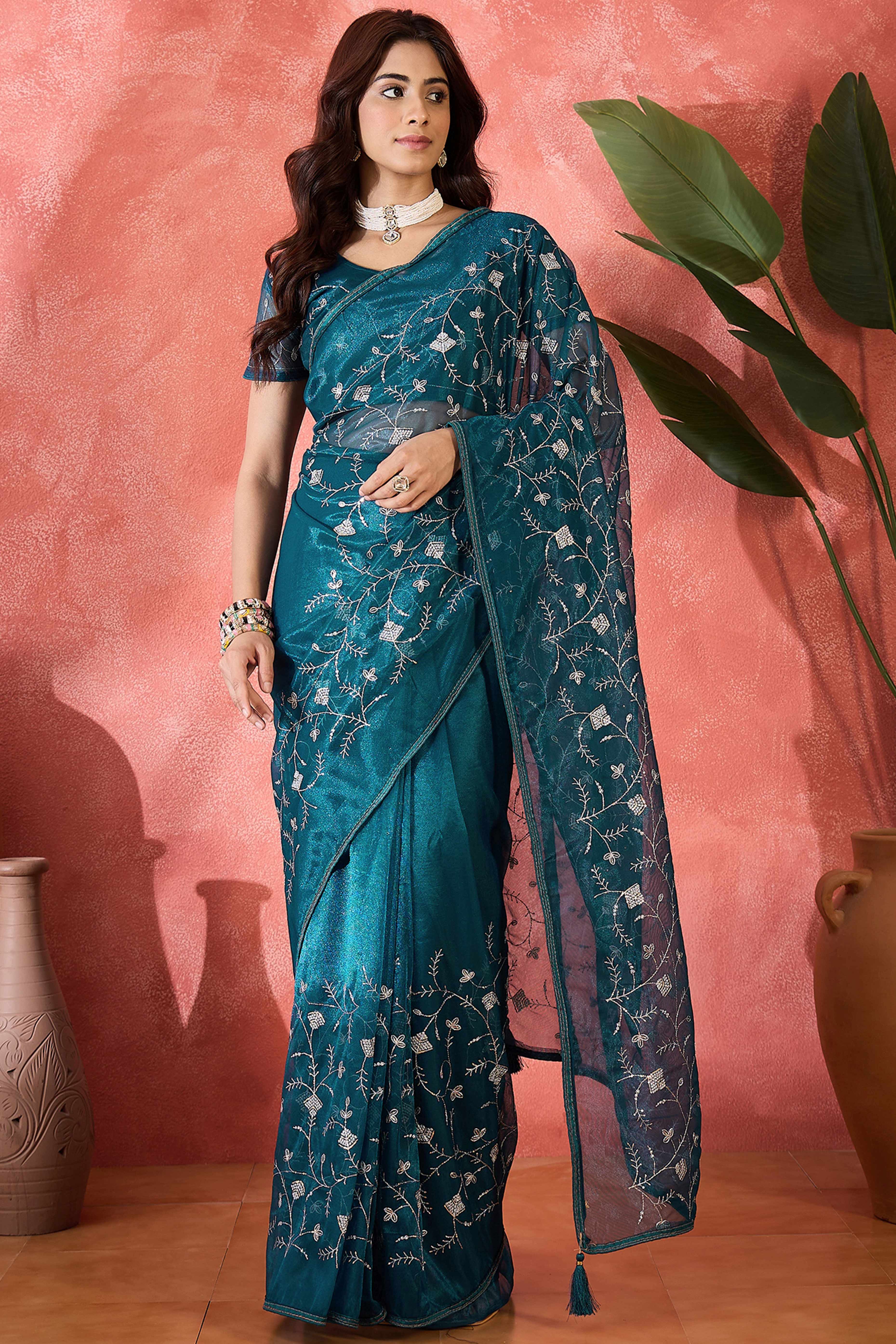 Teal Floral Sequin Embellished Saree In Twill Net With Tassel Accents