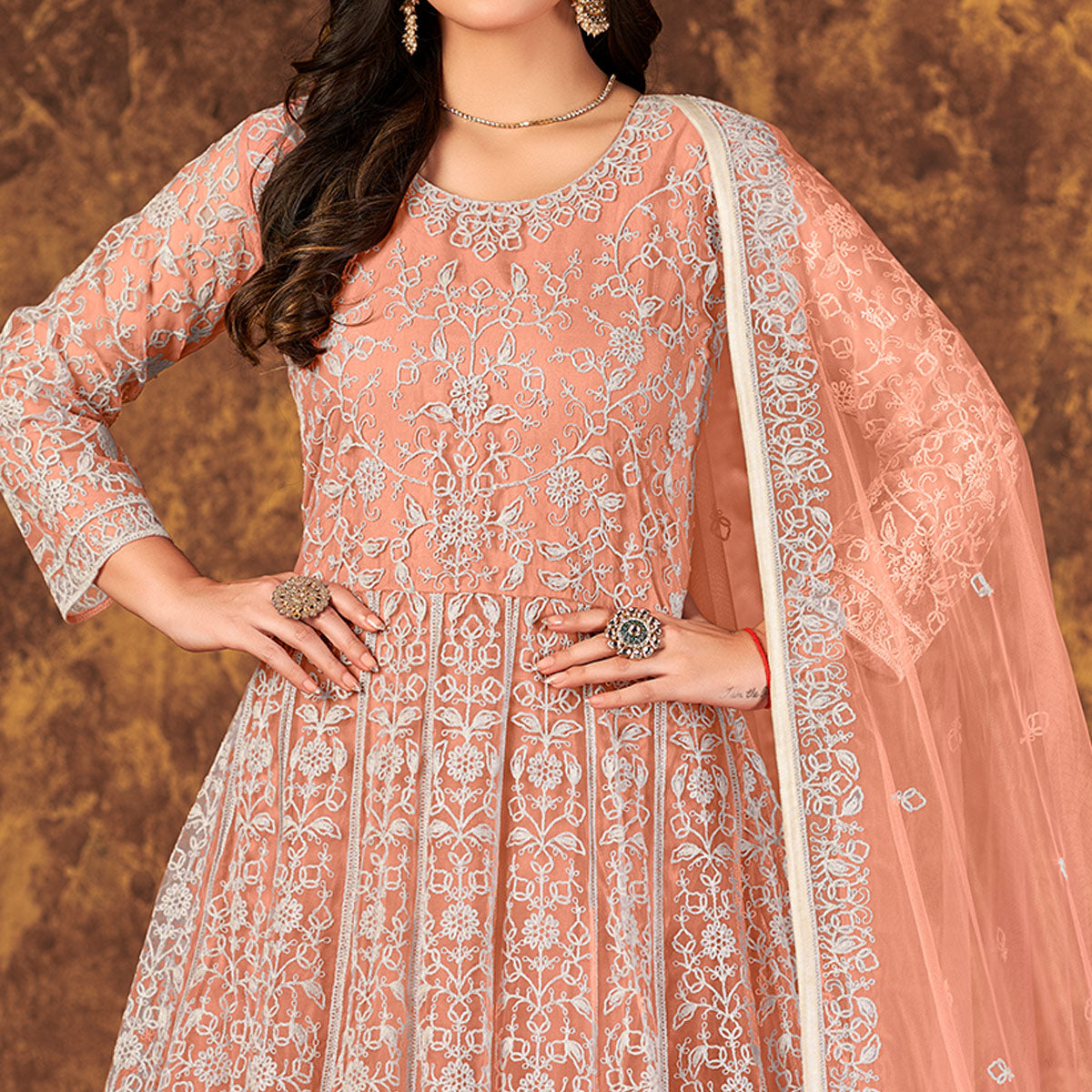 Peach Floral Embroidered Net Semi Stitched Dress Material