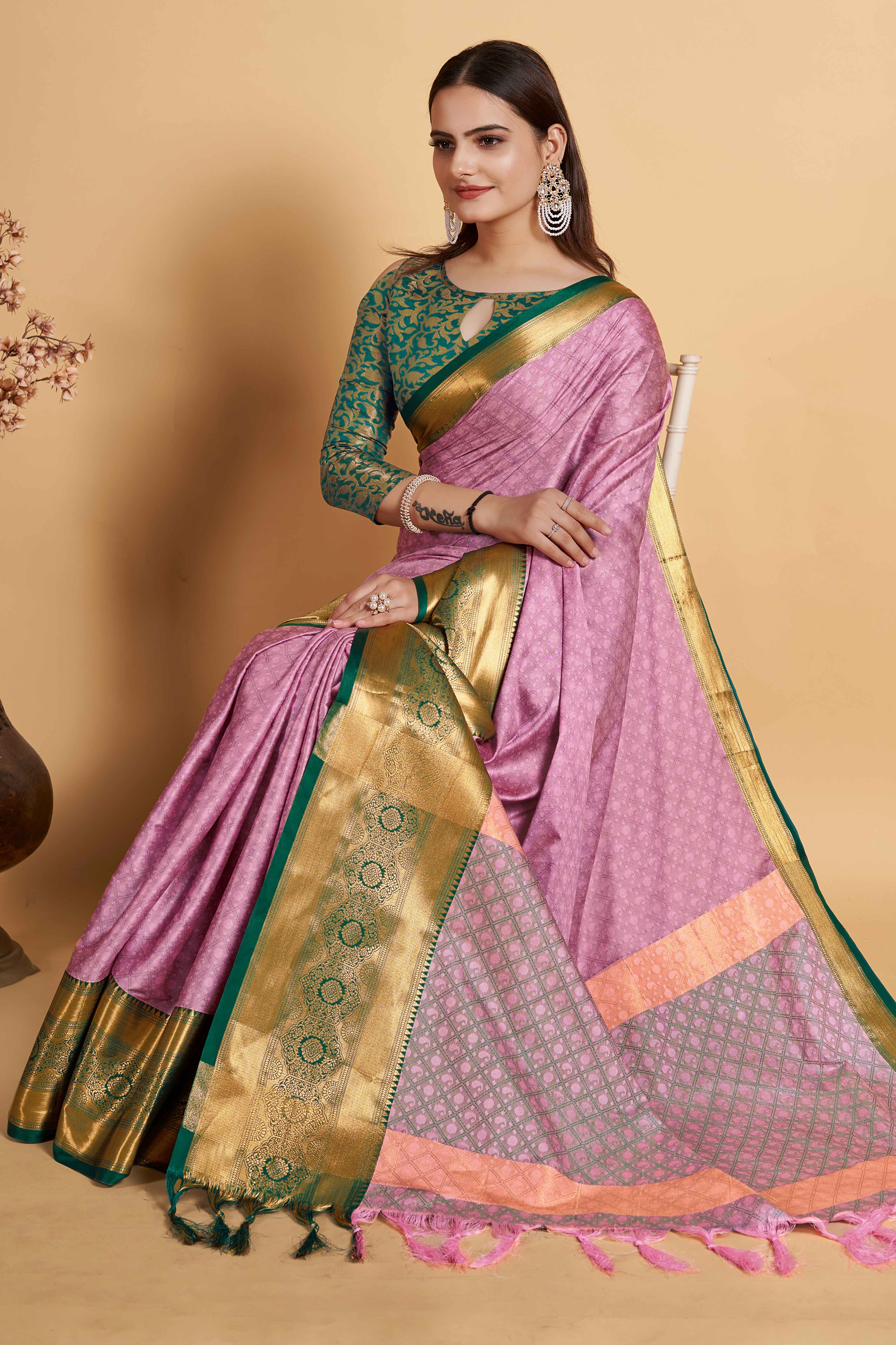 Pink Silk Blend Saree With Exquisite Zari Weaving & Graceful Tassels