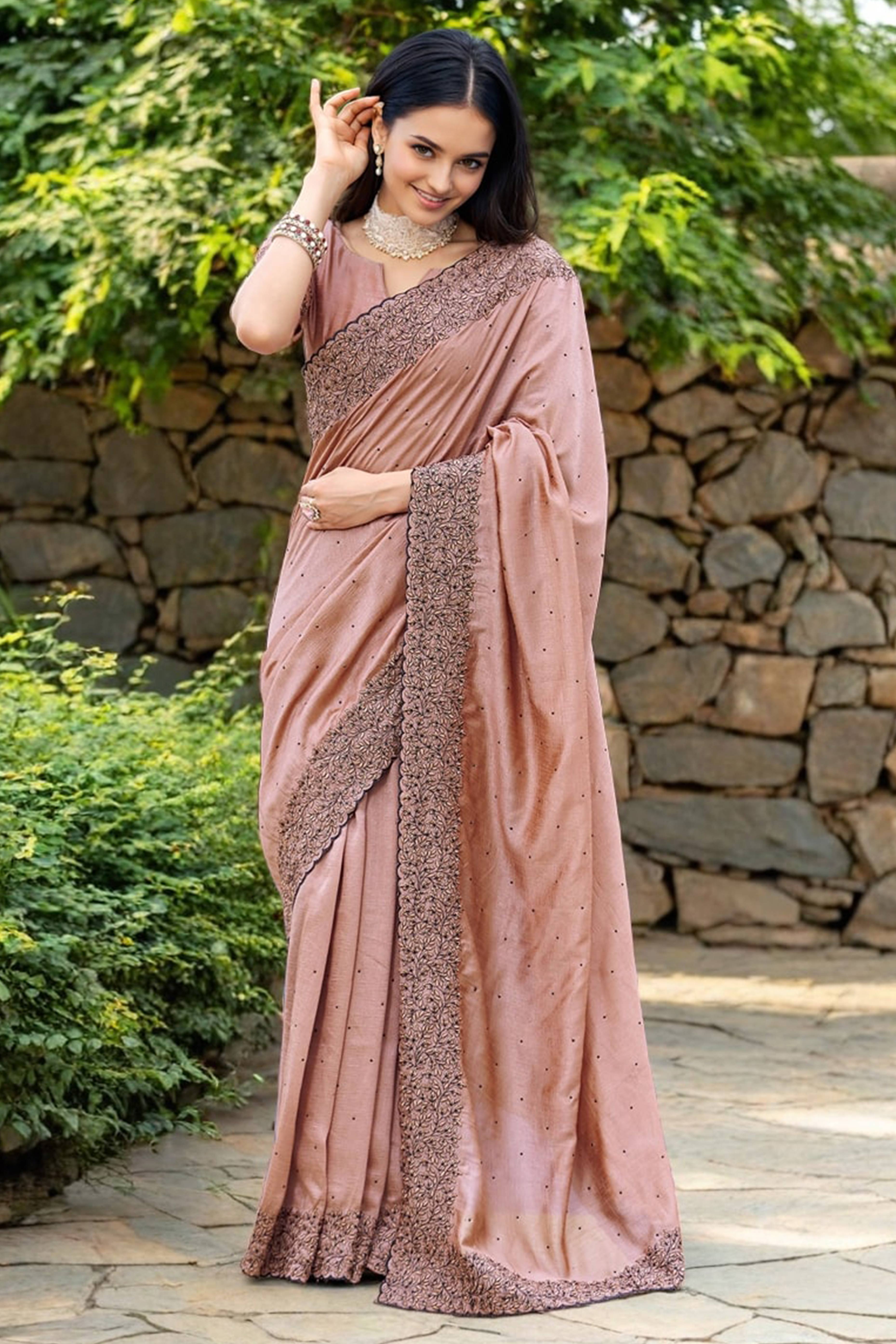Peach Swarovski Work Rangoli Dola Silk Saree With An Eye Catching Border Design
