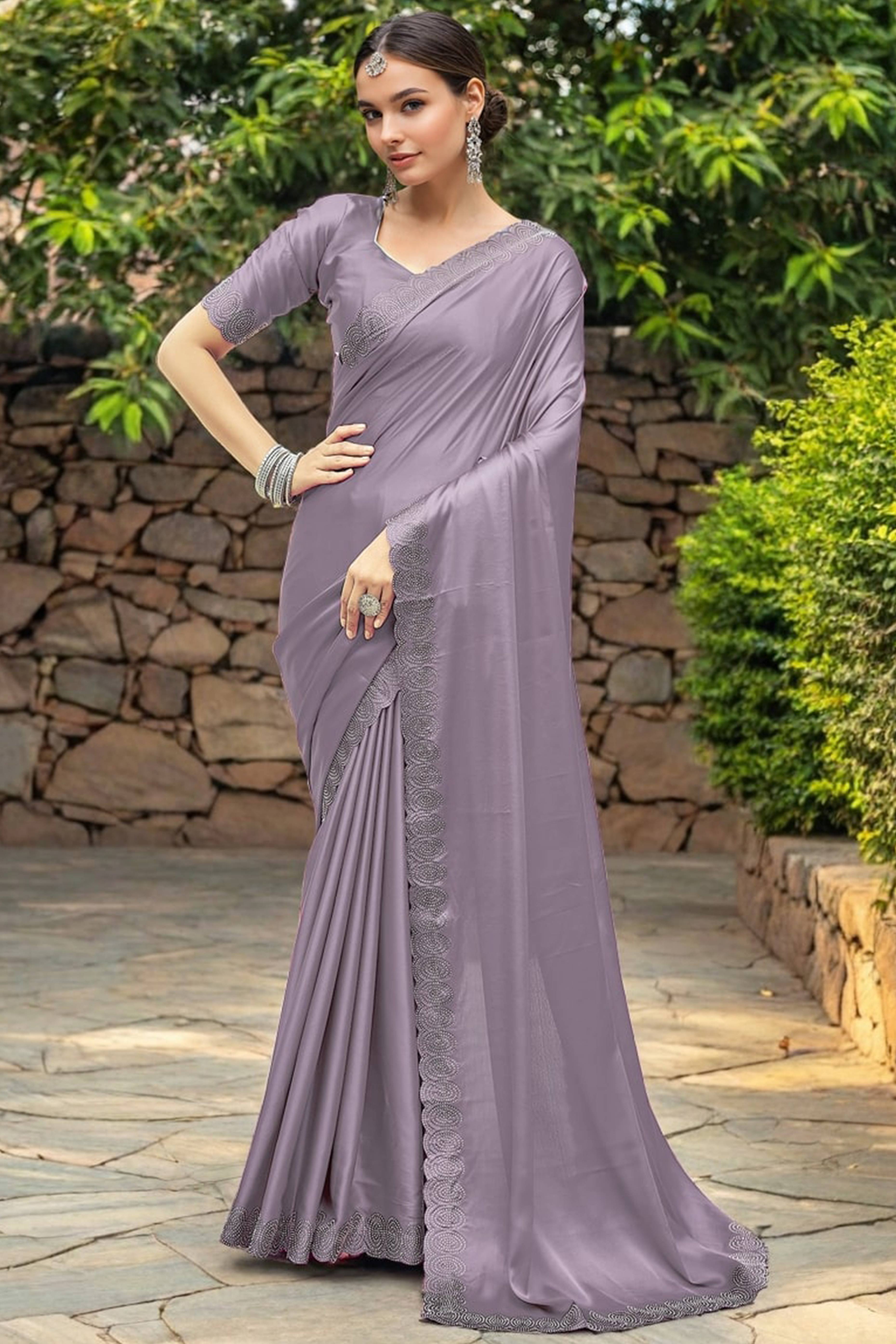 Lavender Solid Rangoli Dola Silk Saree Featuring Sparkling Swarovski Work Border