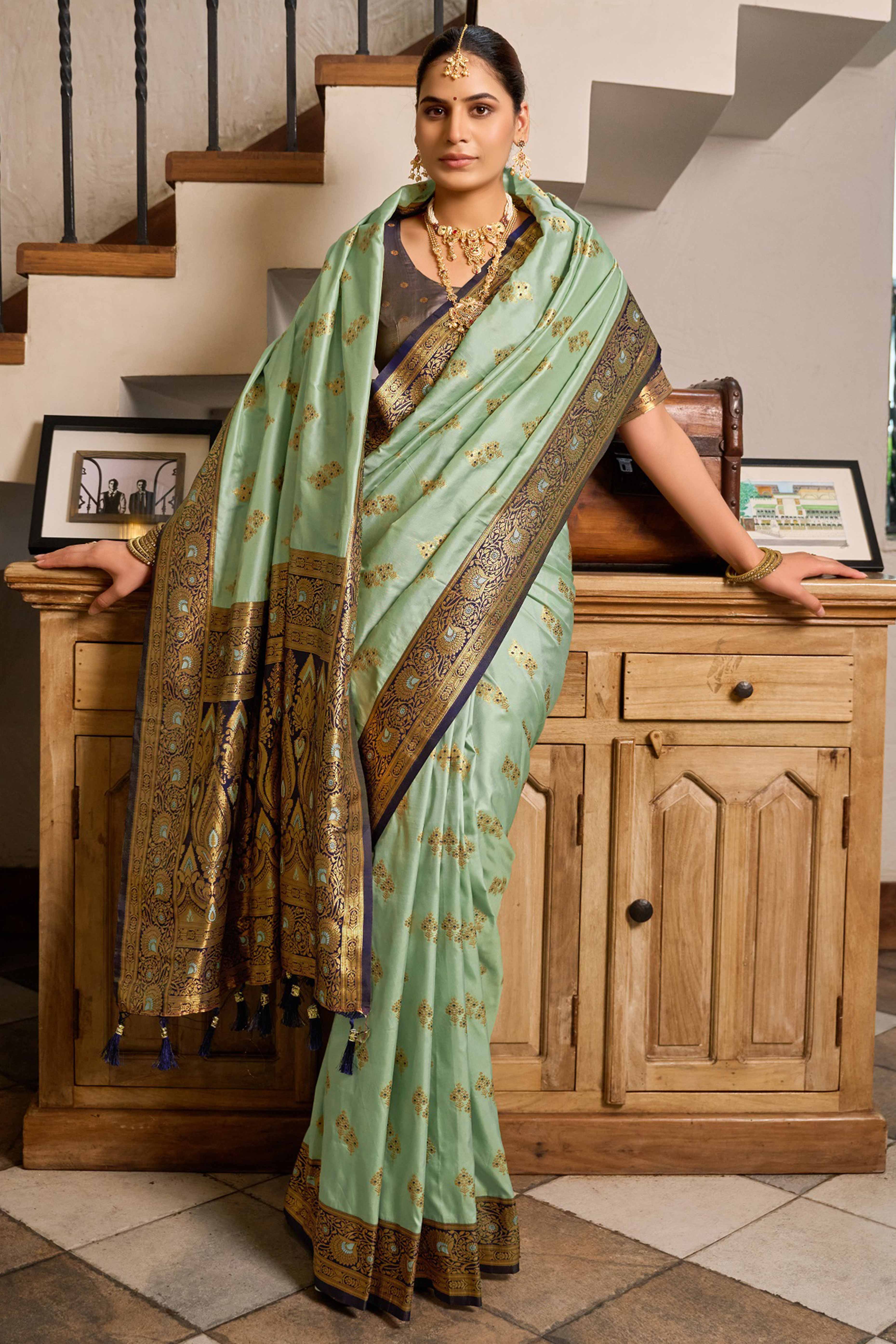 Sea Green Silk Blend Saree Featuring Intricate Floral Zari Work