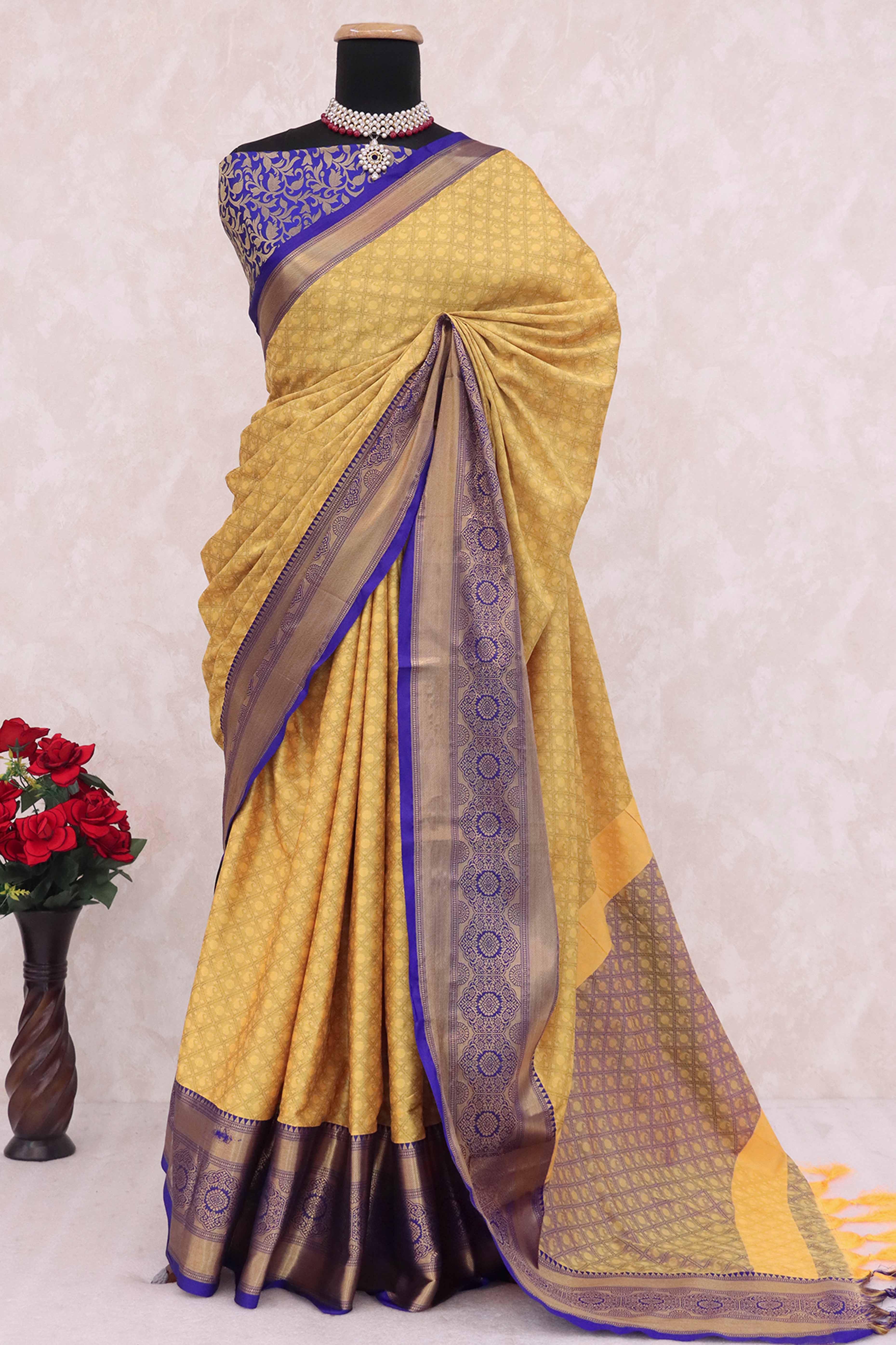 Mustard Silk Blend Saree With Detailed Zari Weaving & Tassel Embellishments
