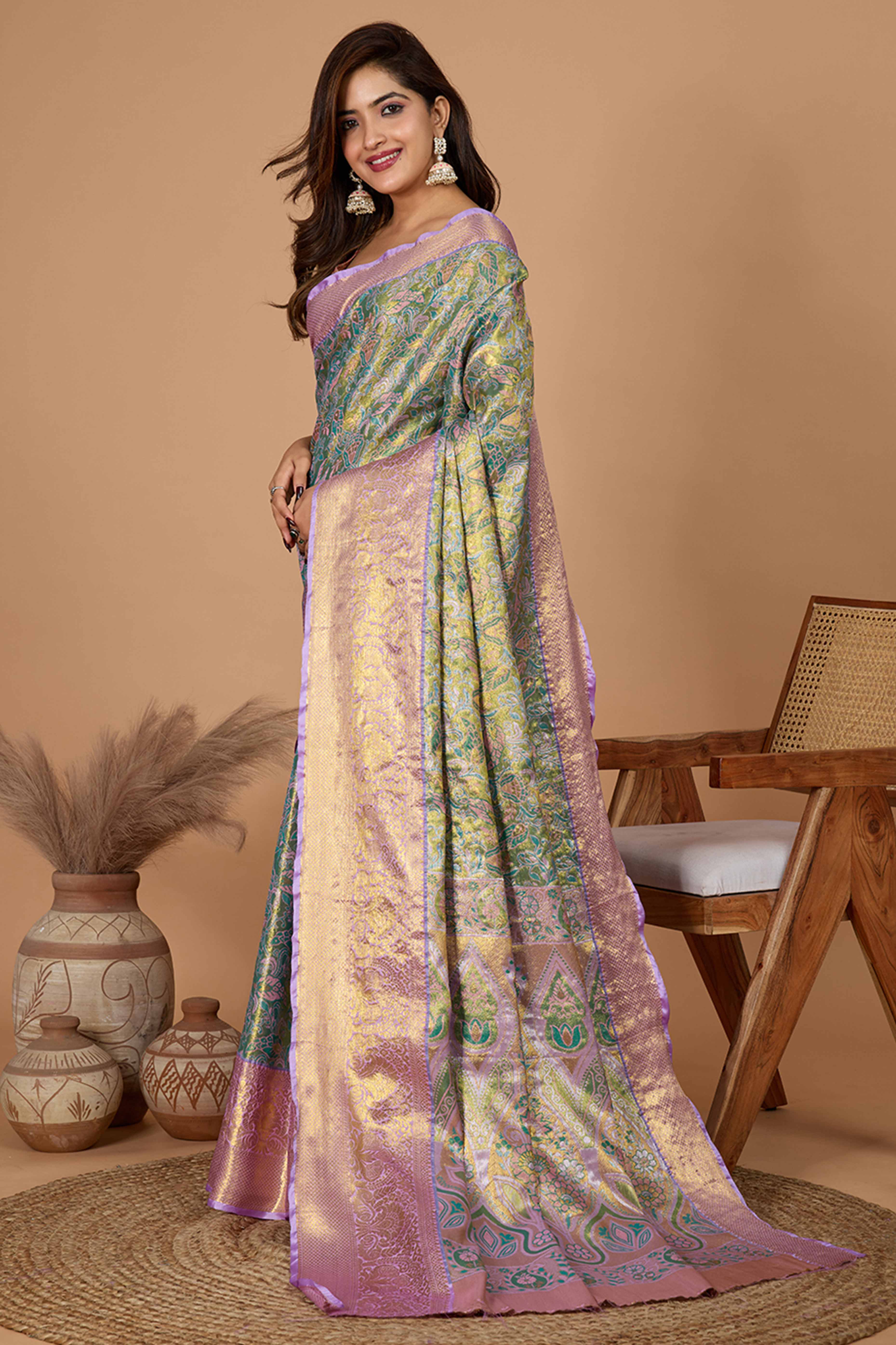 Pista Green Kanjivaram Silk Saree Adorned With Exquisite Floral Zari Weaving