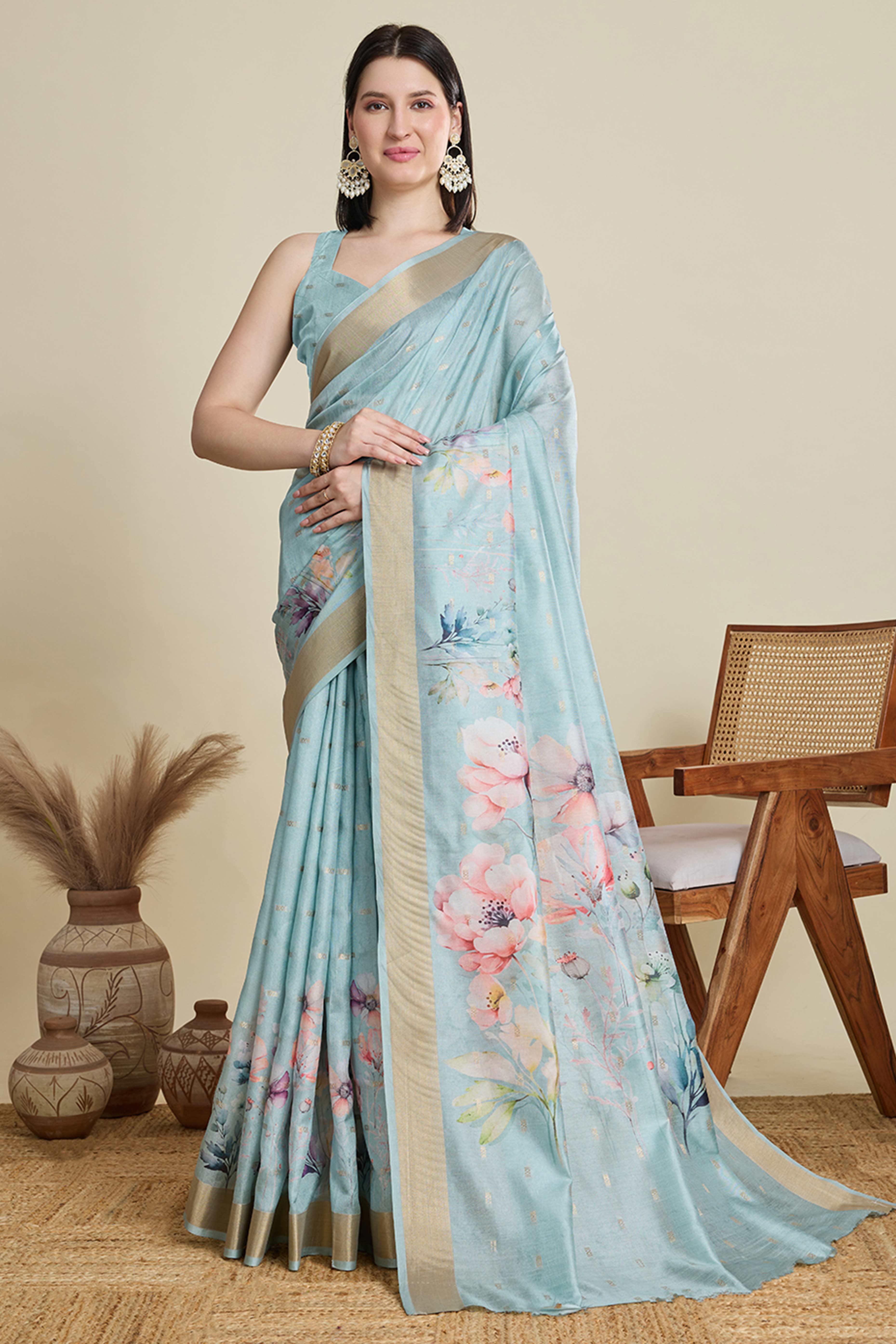 Sky Blue Cotton Blend Saree Featuring Floral Prints and a Festive Zari Border Accent