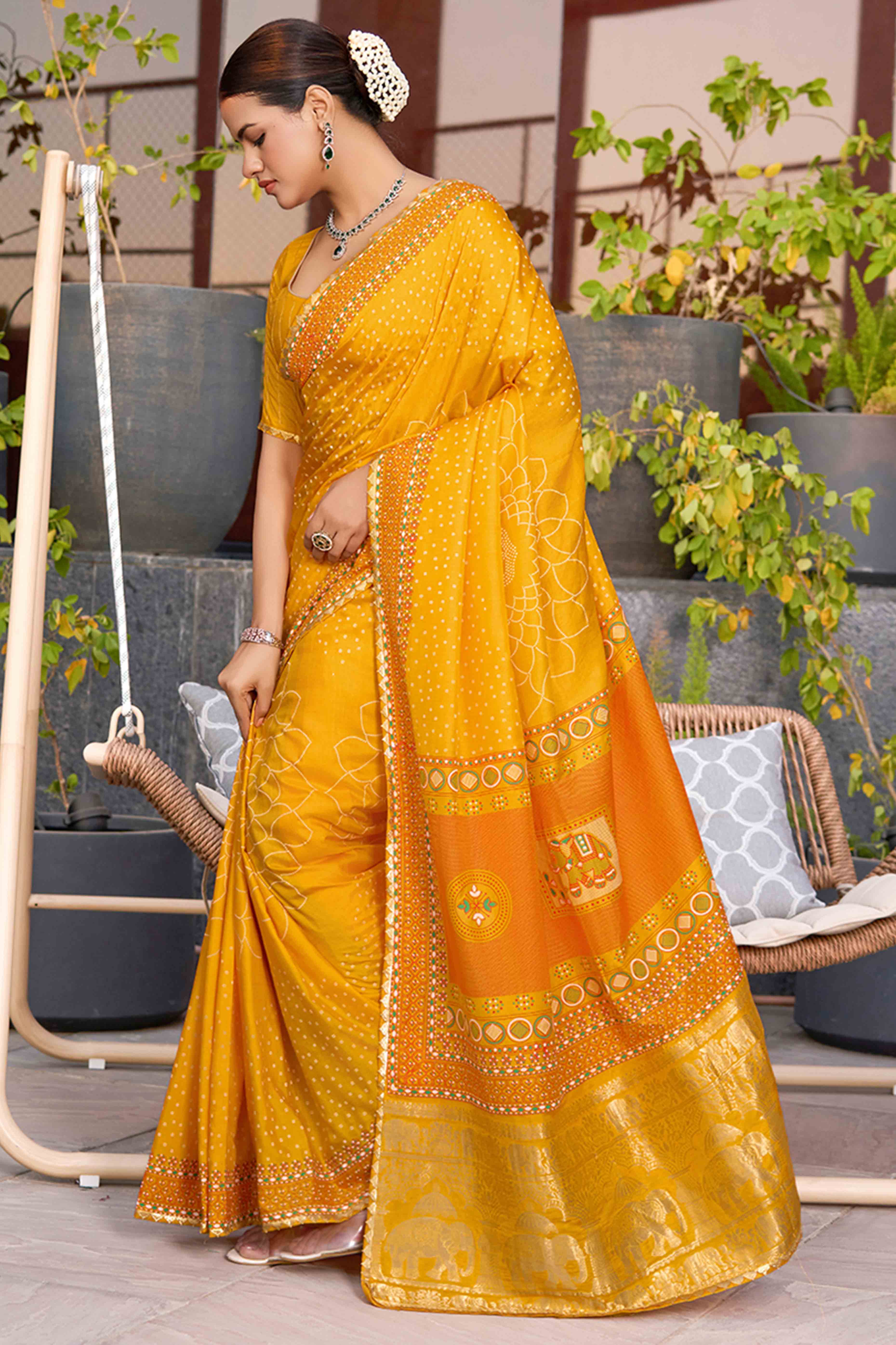 Feel The Luxury Of Mustard Bandhani Foil Printed Cotton Silk Sarree With Lace Border