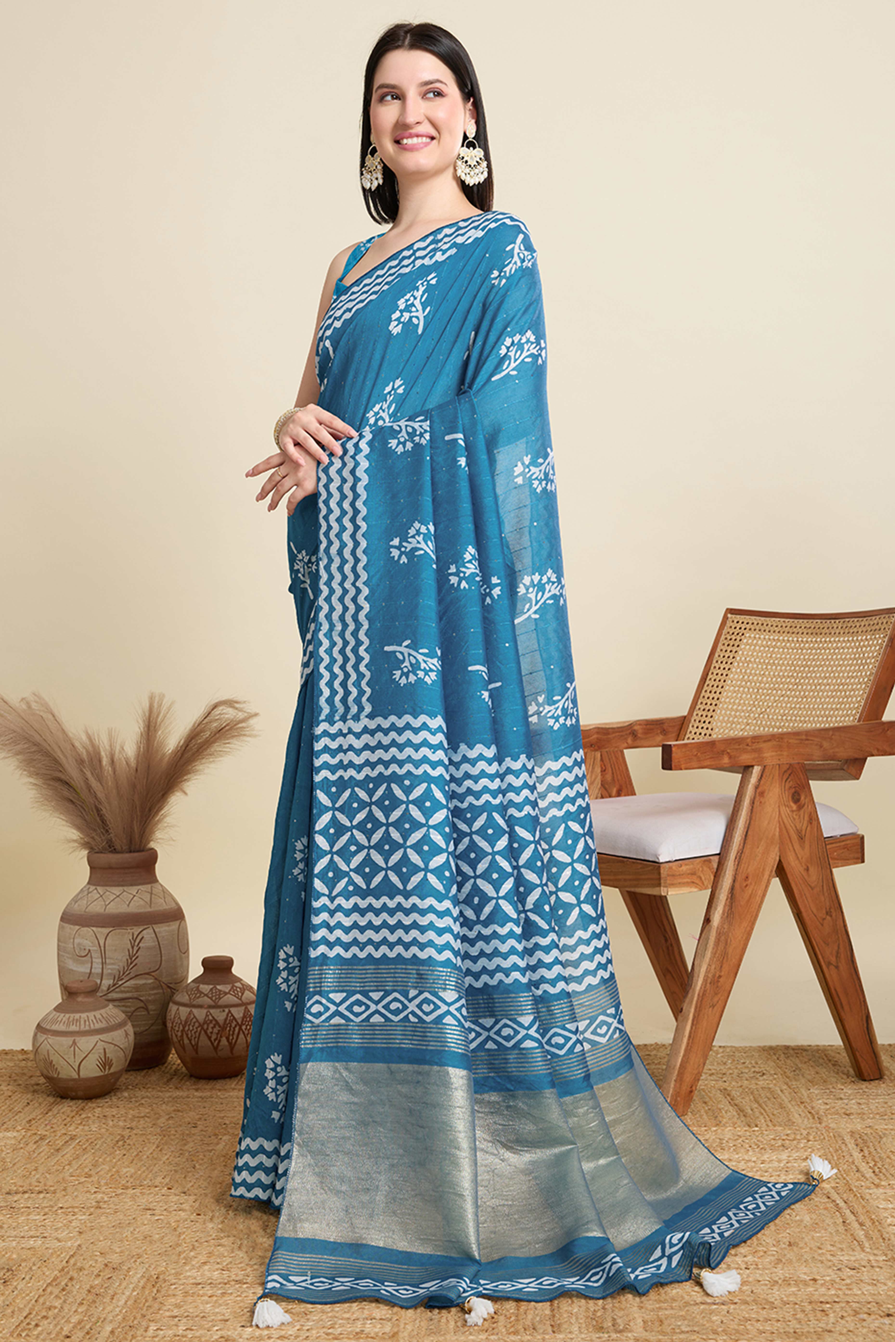 Blue Cotton Blend Saree Featuring Floral Prints and Elegant Sequins Work Accents