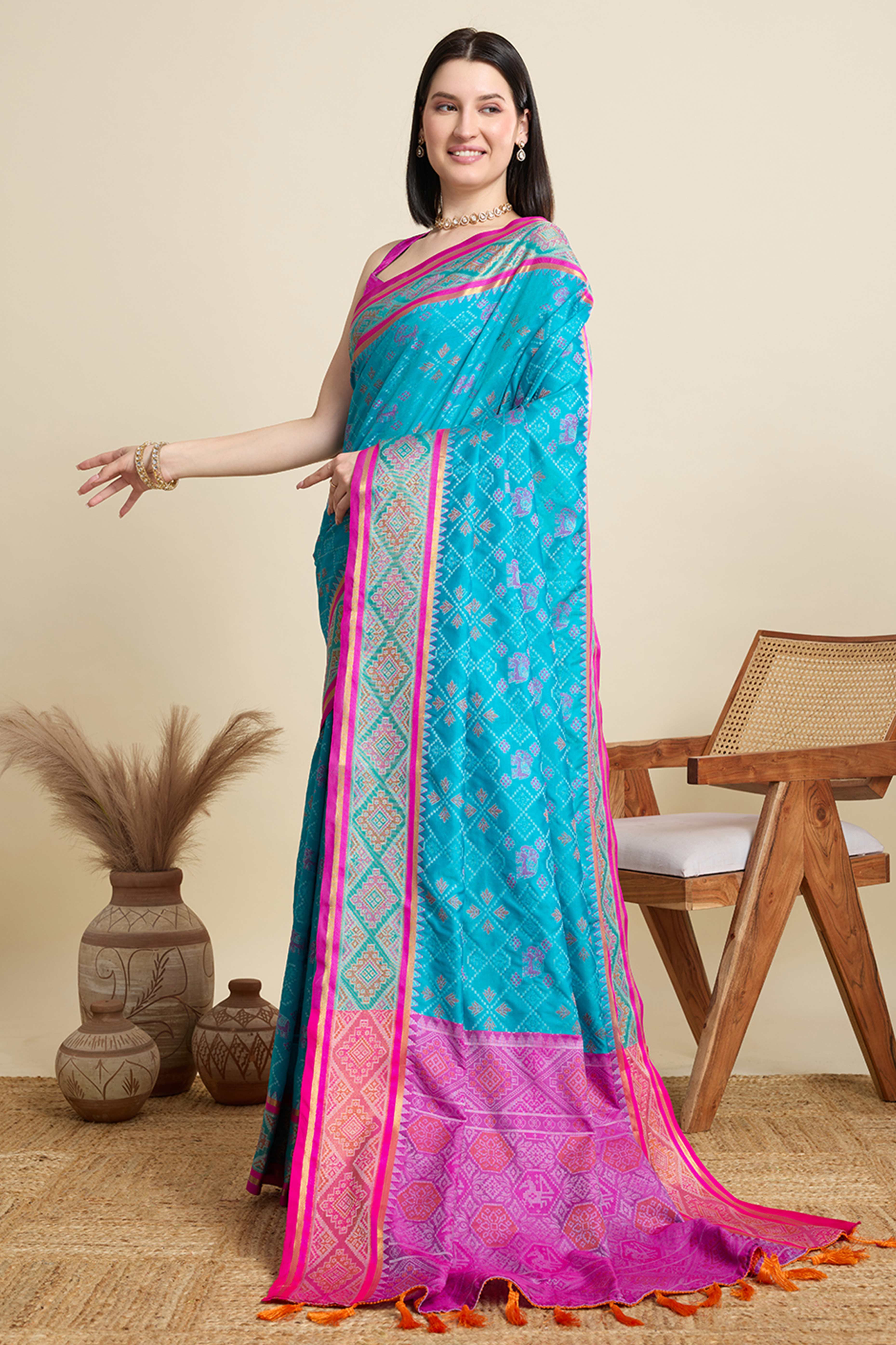Sky Blue Silk Blend Saree Featuring Patola Prints and a Detailed Weaving Border