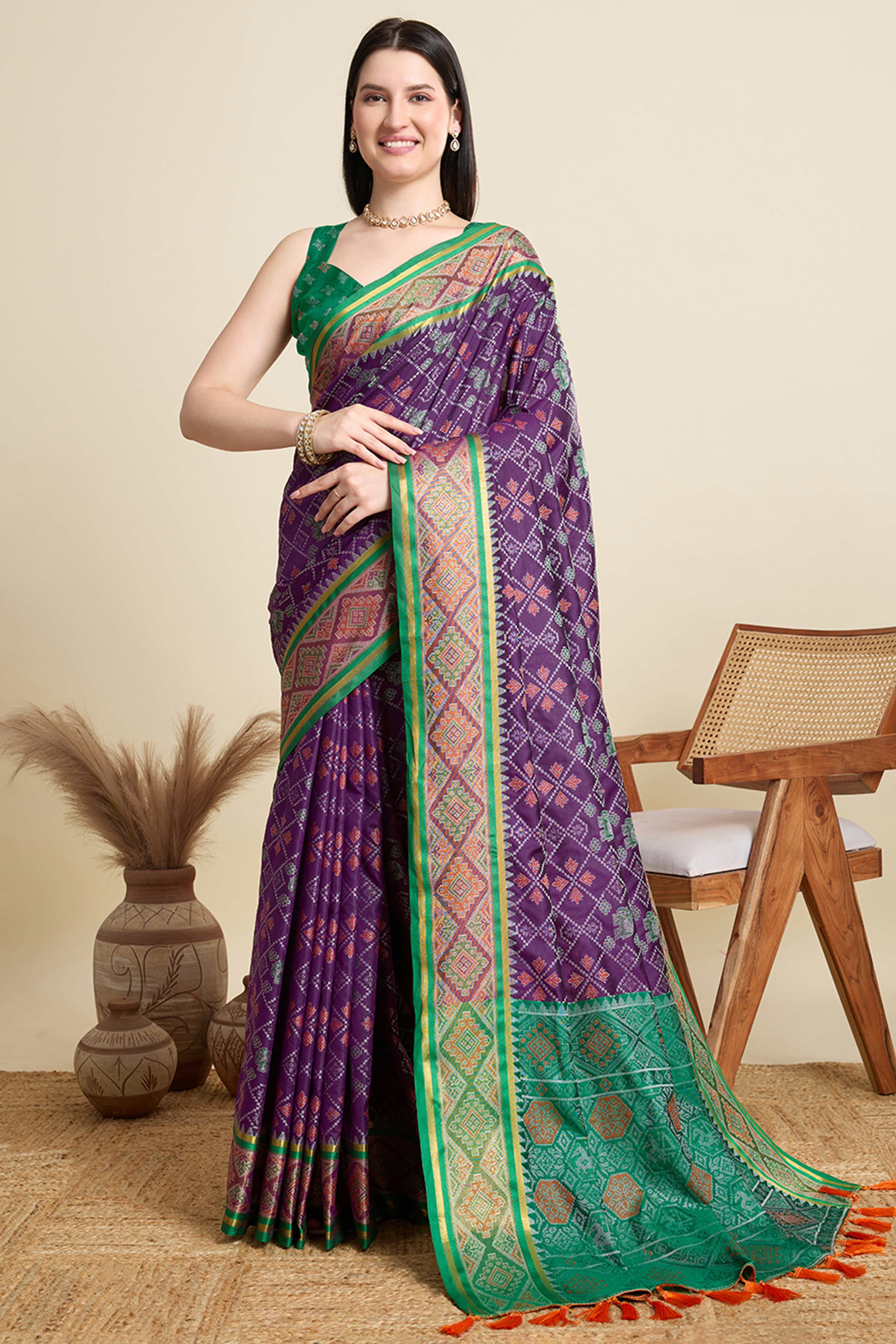 Purple Silk Blend Saree Featuring Patola Prints and a Detailed Weaving Border