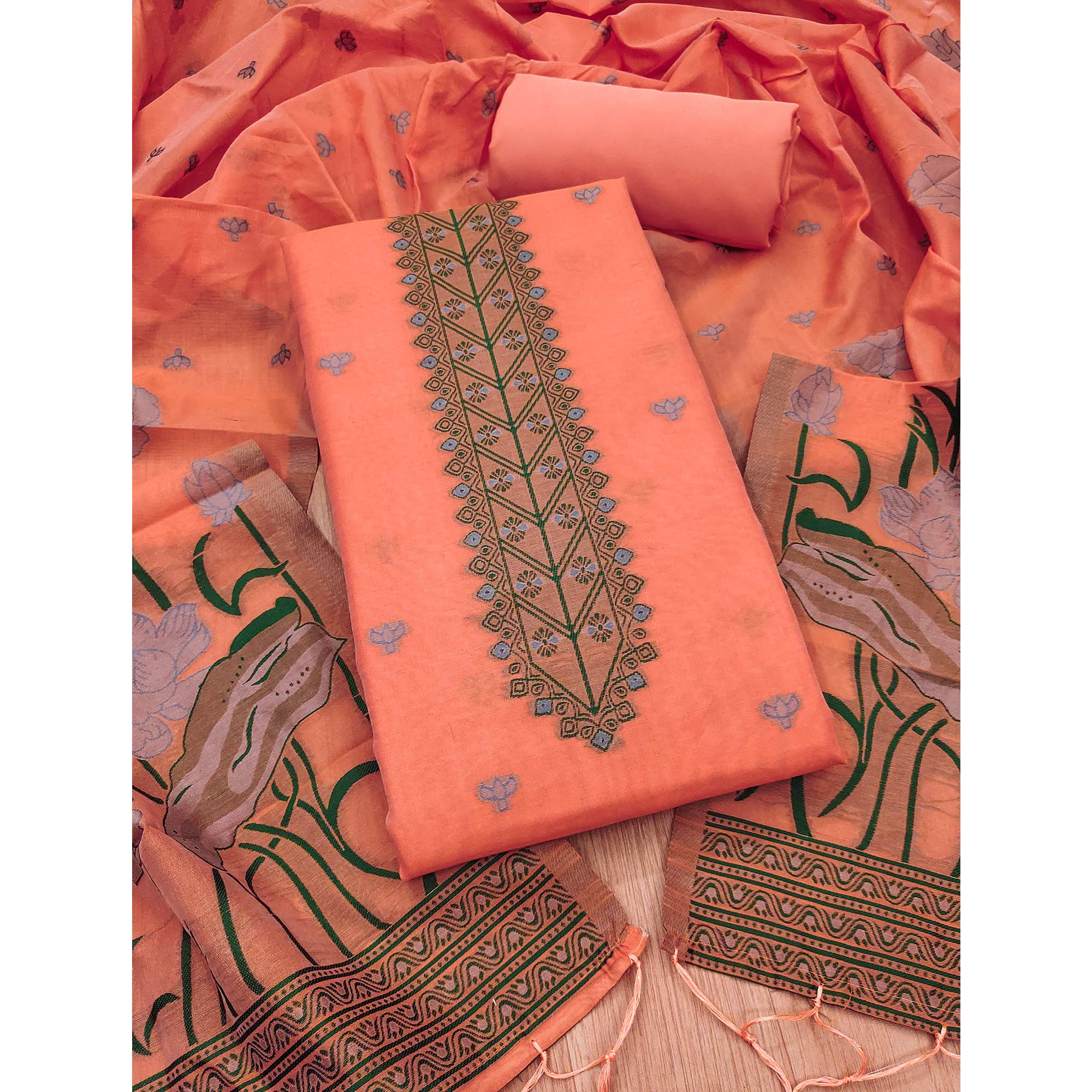Peach Ethnic Dress Material Showcasing Handloom Style Floral Zari Weaving