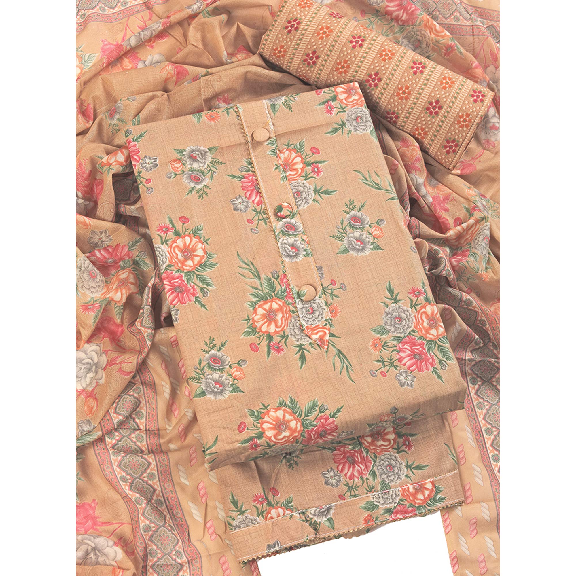 Charming Peach Dress Material in Pure Cotton with Subtle Floral Pattern Work