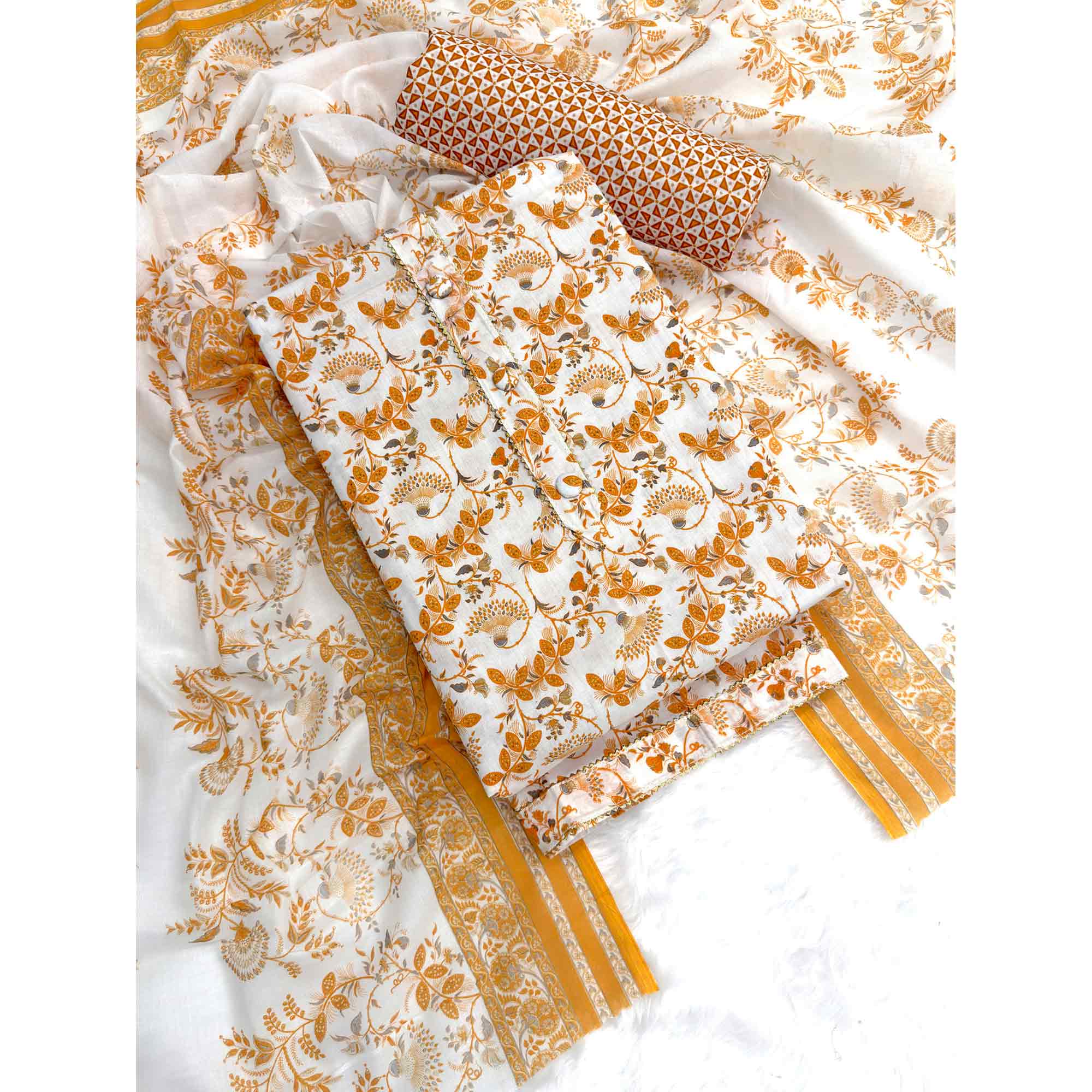 Elegant Mustard Floral Printed Pure Cotton Dress Material With Tie Neck & Fancy Button