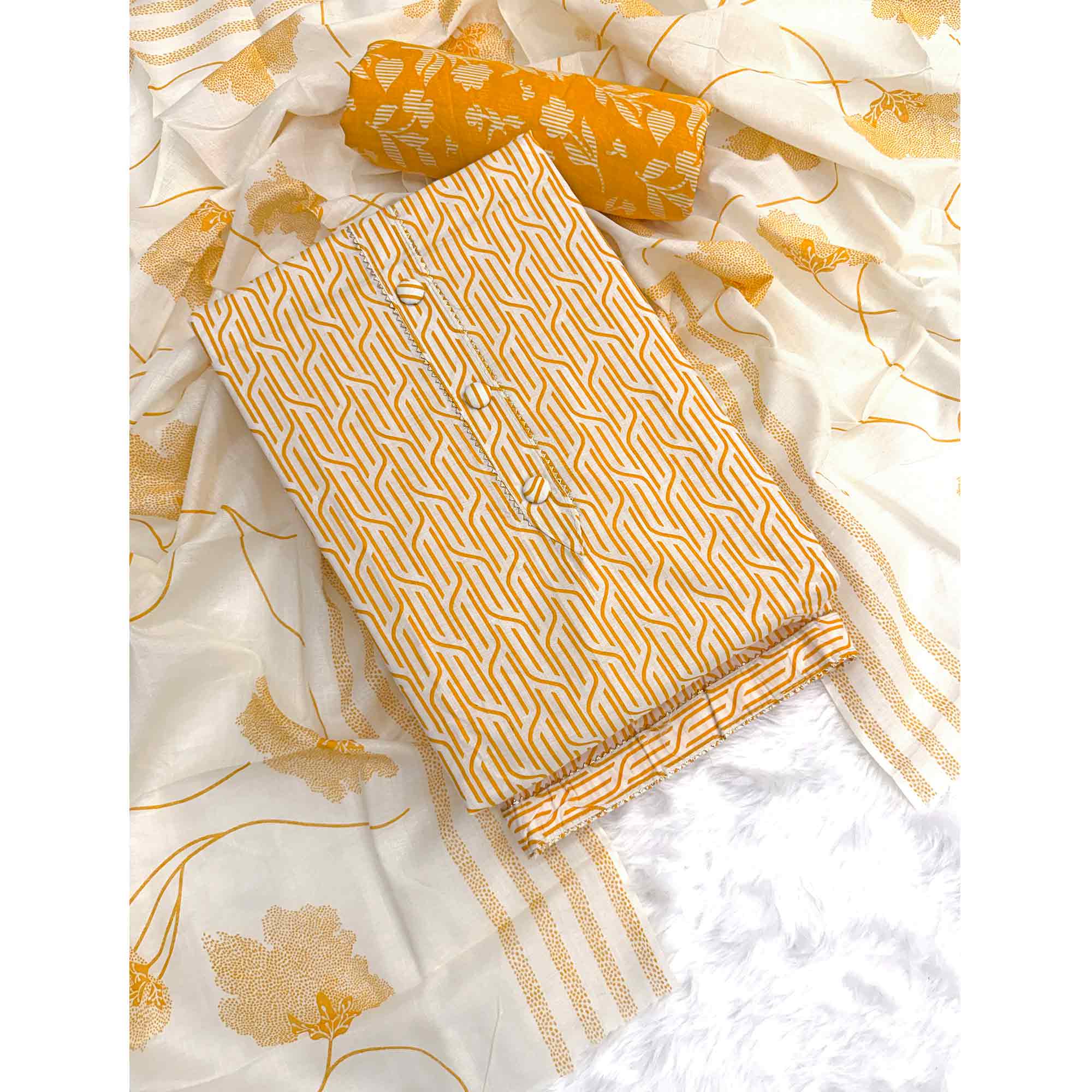 Trendy Mustard Geometric Print Pure Cotton Dress Material Featuring Stylish Tie Neck & Fancy Button