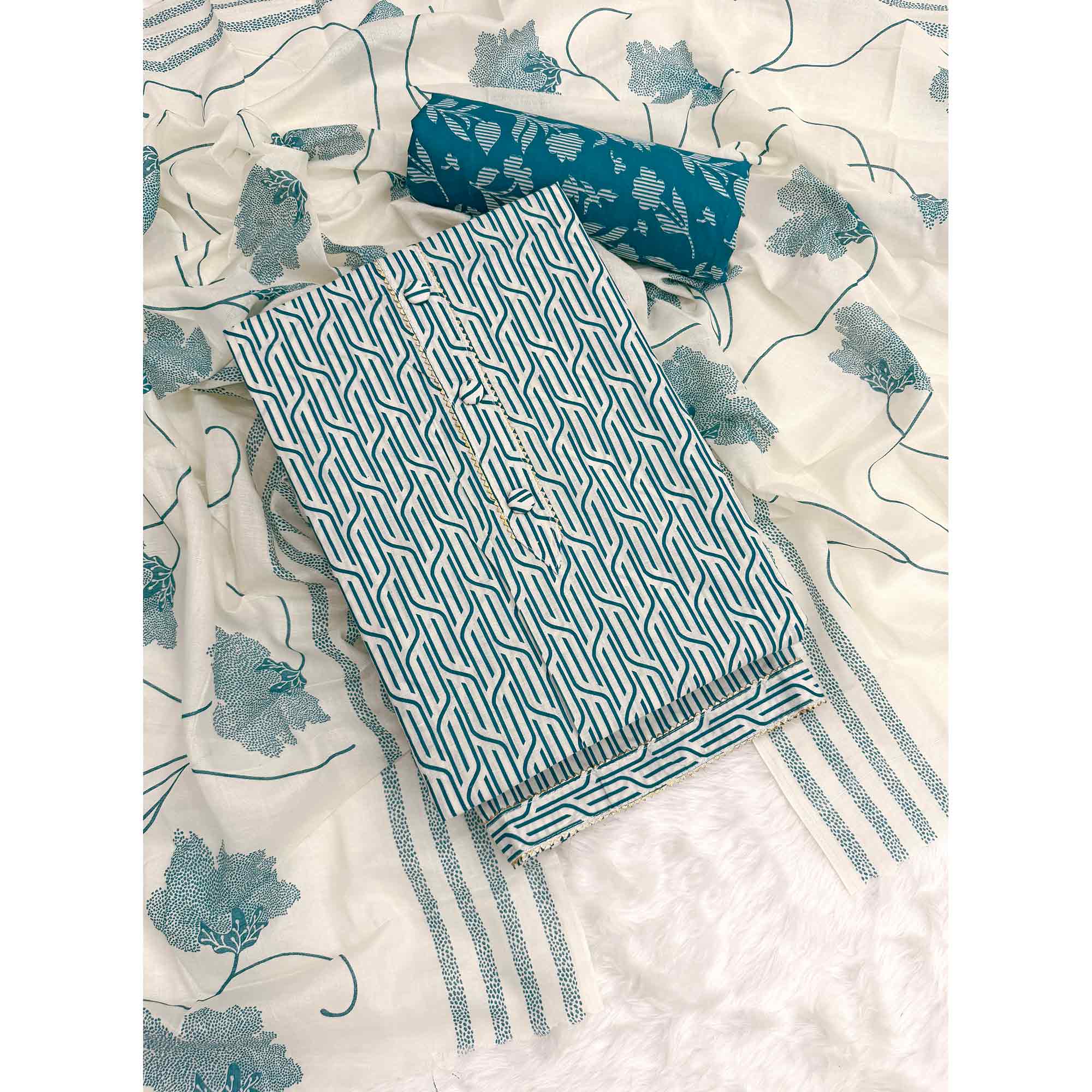 Trendy Teal Geometric Print Pure Cotton Dress Material Featuring Stylish Tie Neck & Fancy Button