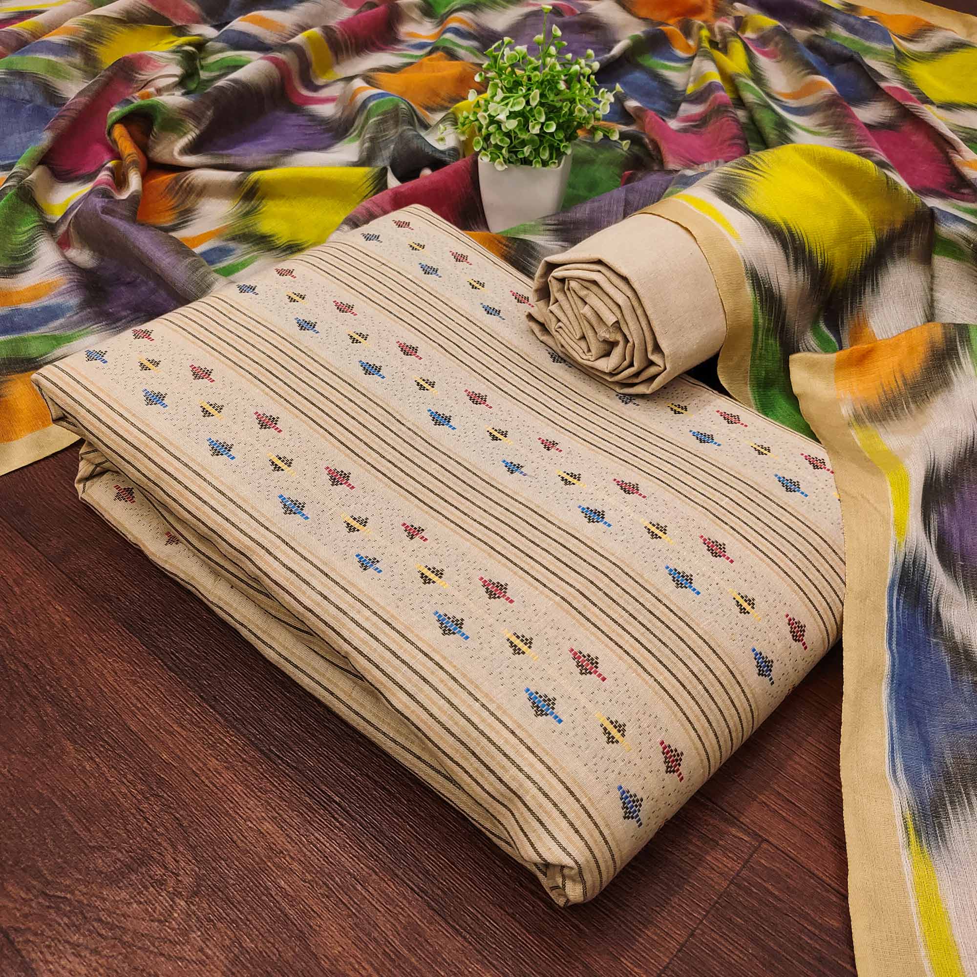 Make a Statement With Chikoo Woven Cotton Blend Dress Material