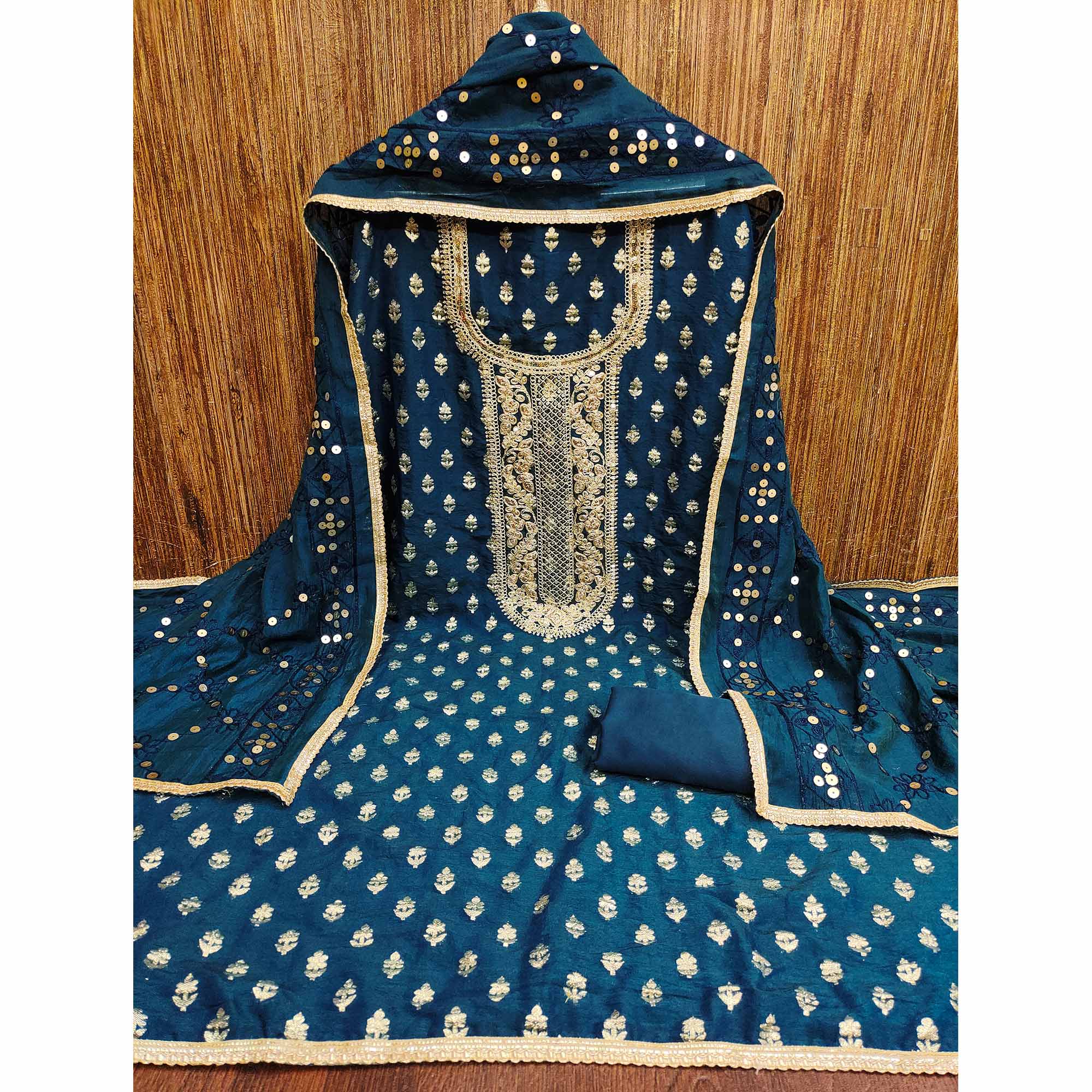 Redefine Elegance With This Morpich Floral Cording Zari Embroidered Chanderi Dress Material