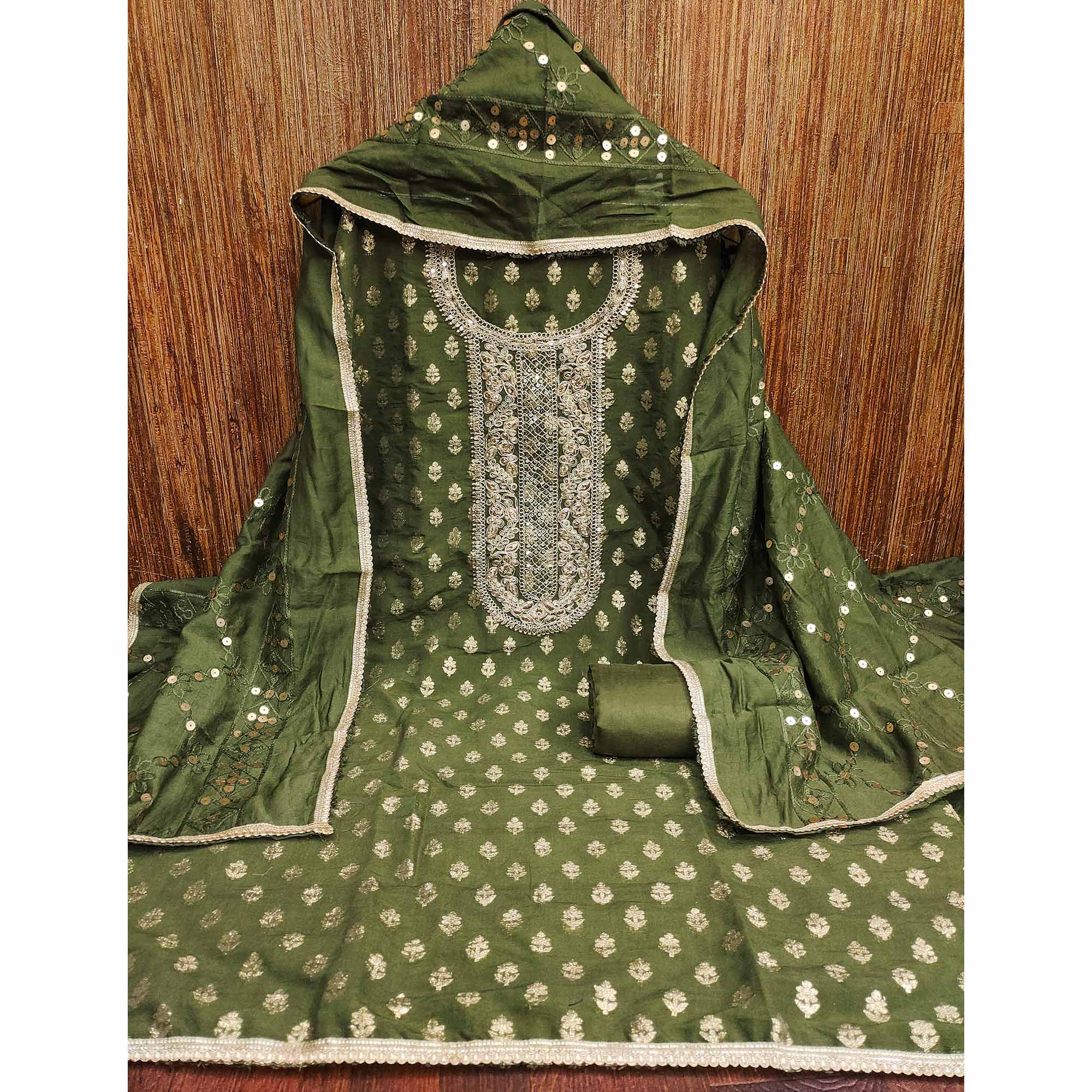 Green Chanderi Cotton Fabric with Elegant Butti Zari Weaving for a Festive Yet Soft Look