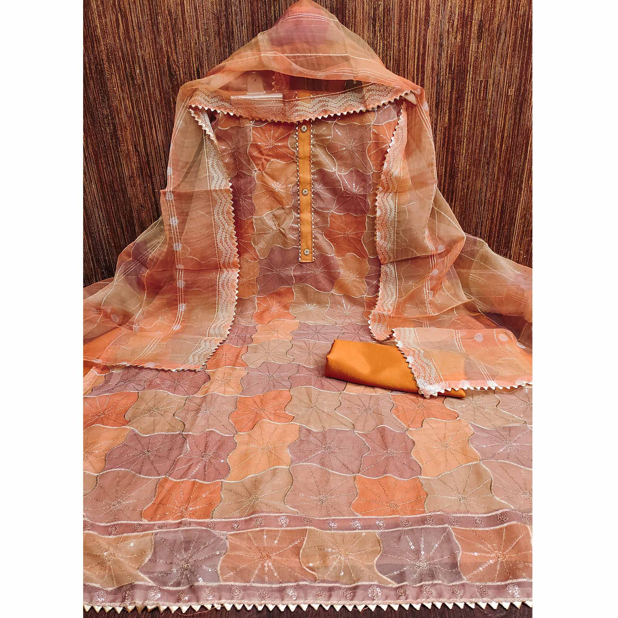 Orange Organza Suit Material with Delicate Sequins Embroidery to Elevate Your Look