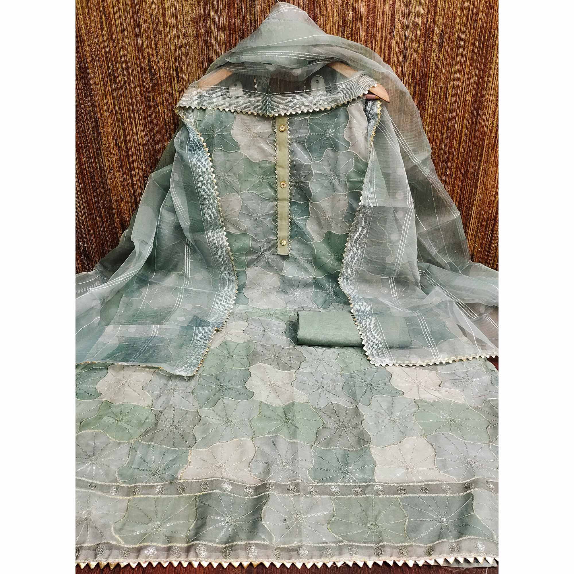 Sea Green Organza Suit Material with Delicate Sequins Embroidery to Elevate Your Look