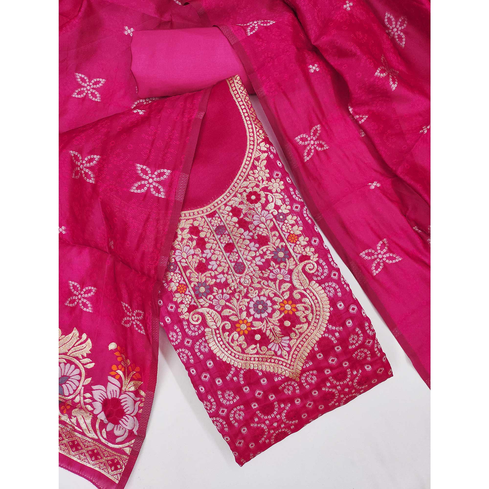 Rani Pink Banarasi Silk Jacquard Dress Material Adorned With Intricate Floral Zari Weaving