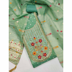 Green Shimmer Dress Material Adorned With Graceful Floral Weaving & Delicate Sequins Embroidery