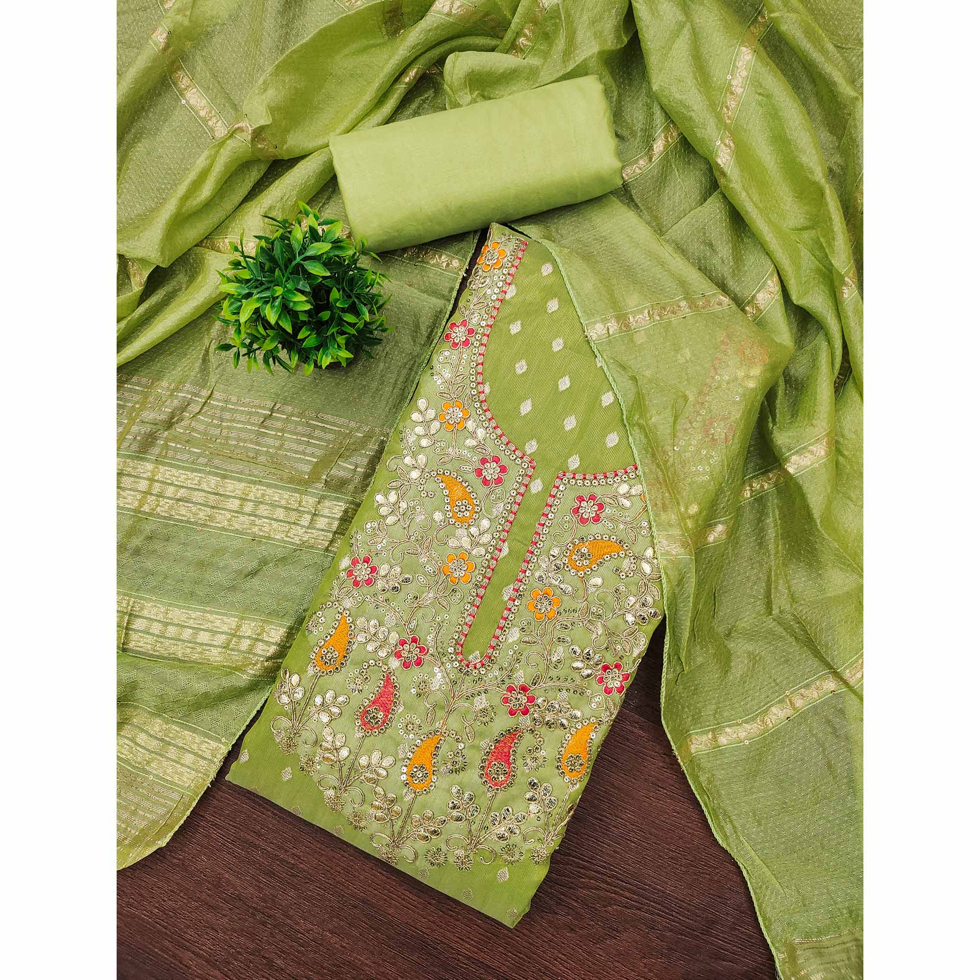 Green Woven Shimmer Dress Material Featuring Sequins Embroidery & Gota Patti Accents