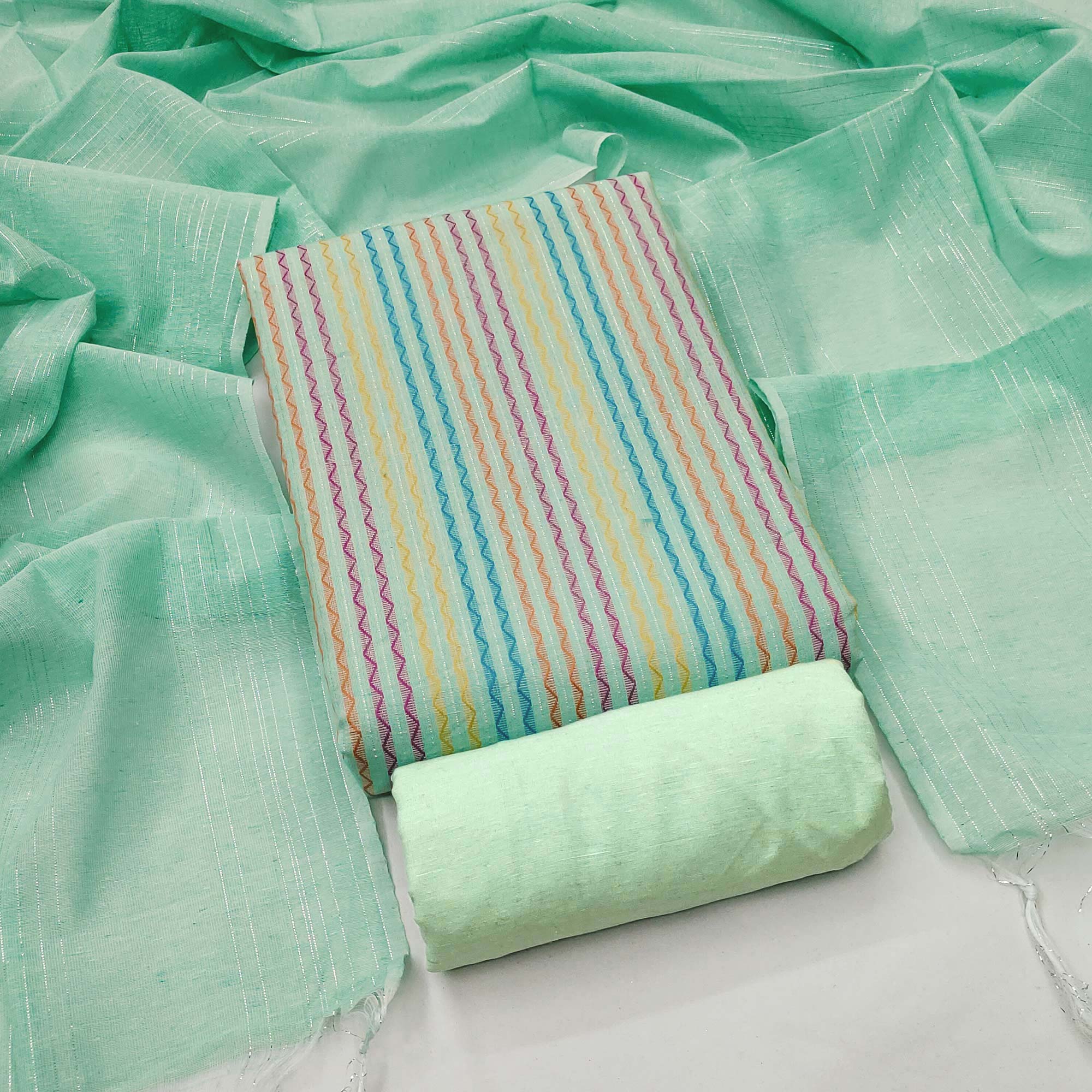 Sea Green Poly Cotton Blend Dress Material Highlighted With Striped Woven Work
