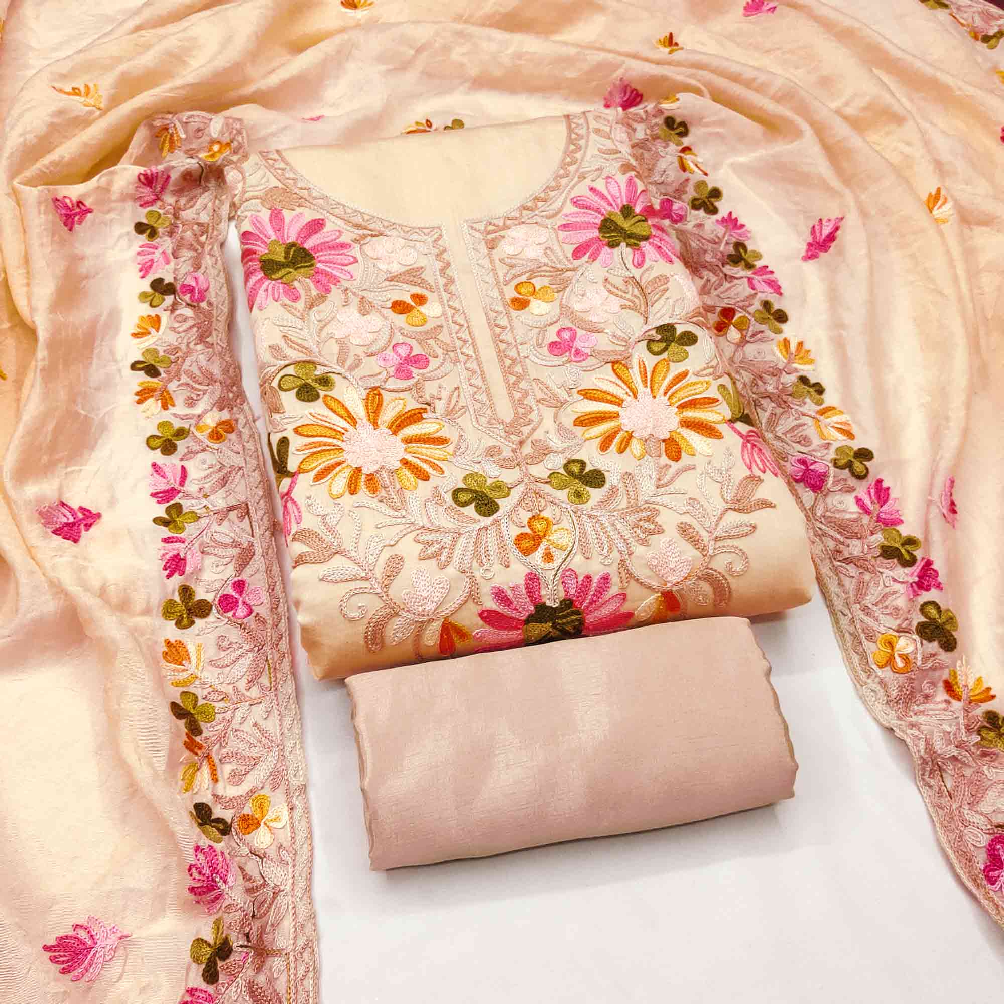 Chikoo Designer Roman Art Silk Dress Material Adorned With Floral Thread Embroidery Work
