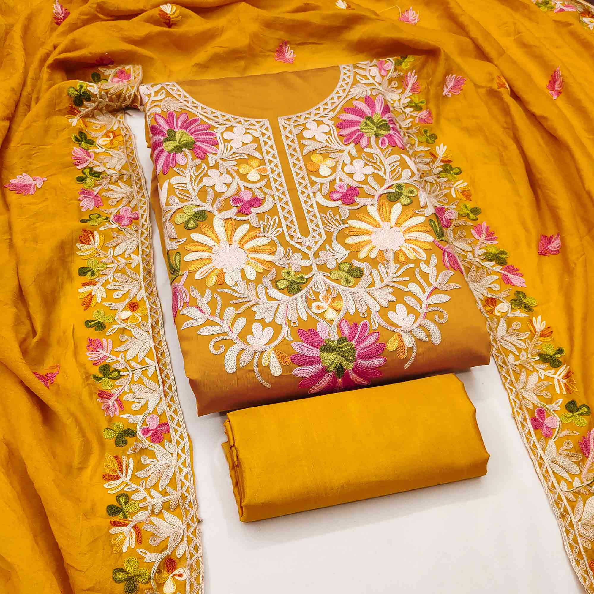 Dark Mustard Designer Roman Art Silk Dress Material Adorned With Floral Thread Embroidery Work