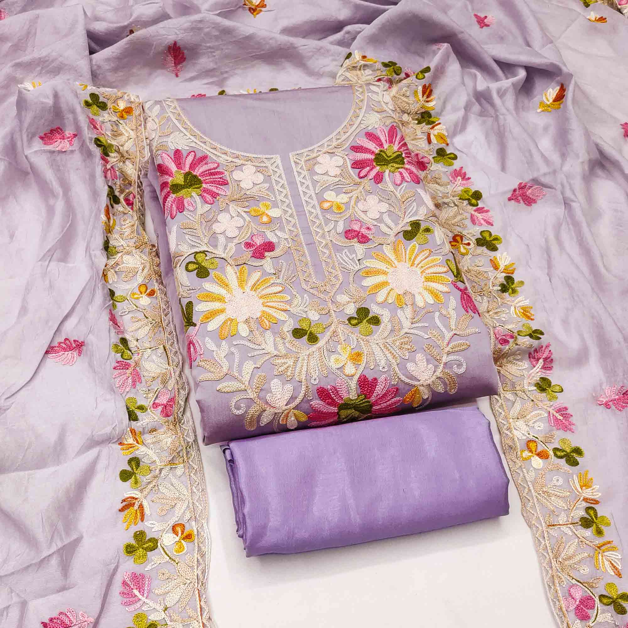 Lavender Designer Roman Art Silk Dress Material Adorned With Floral Thread Embroidery Work